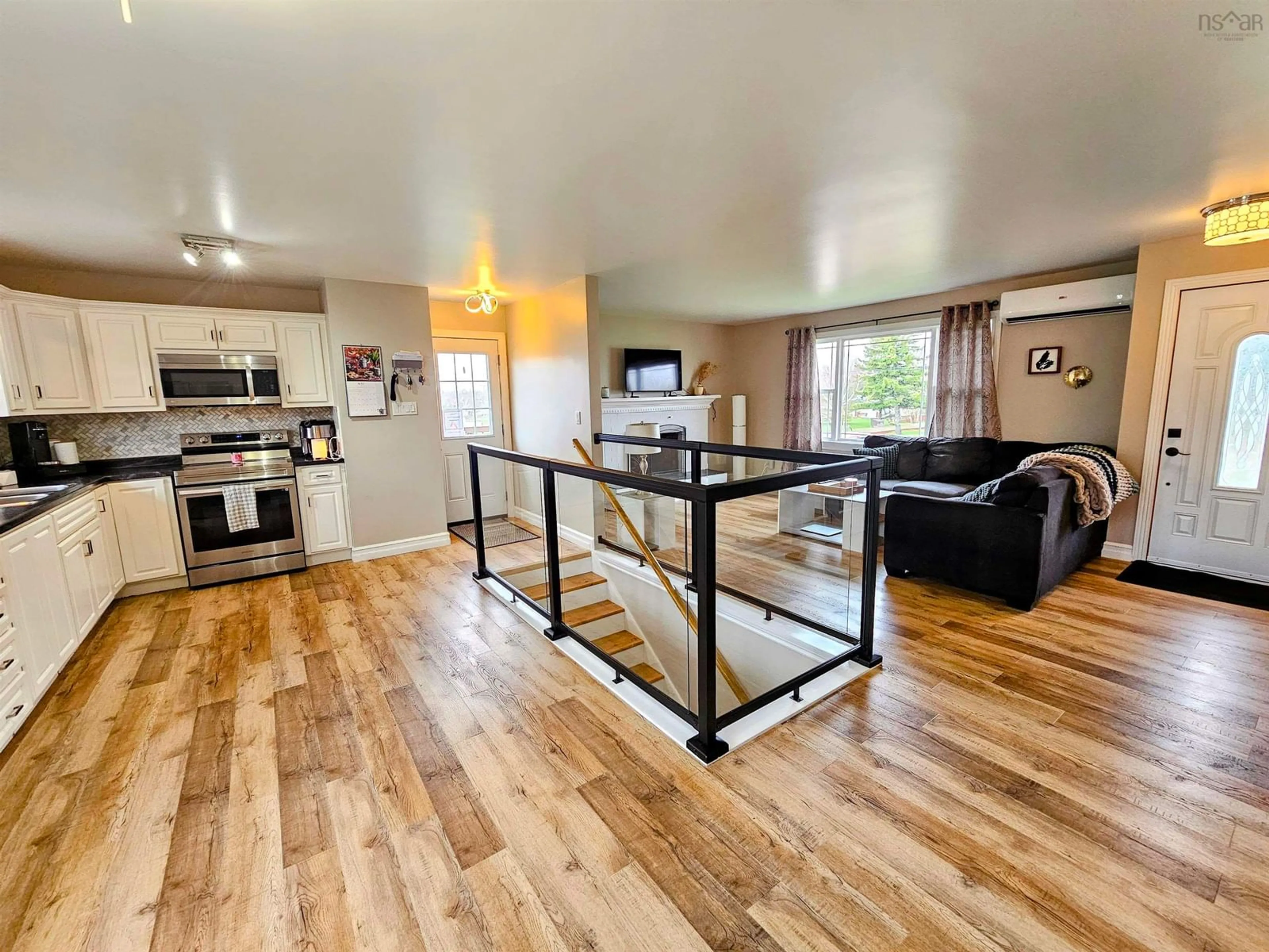 Open concept kitchen, wood/laminate floor for 152 Haulage Rd, Reserve Mines Nova Scotia B1E 1B9