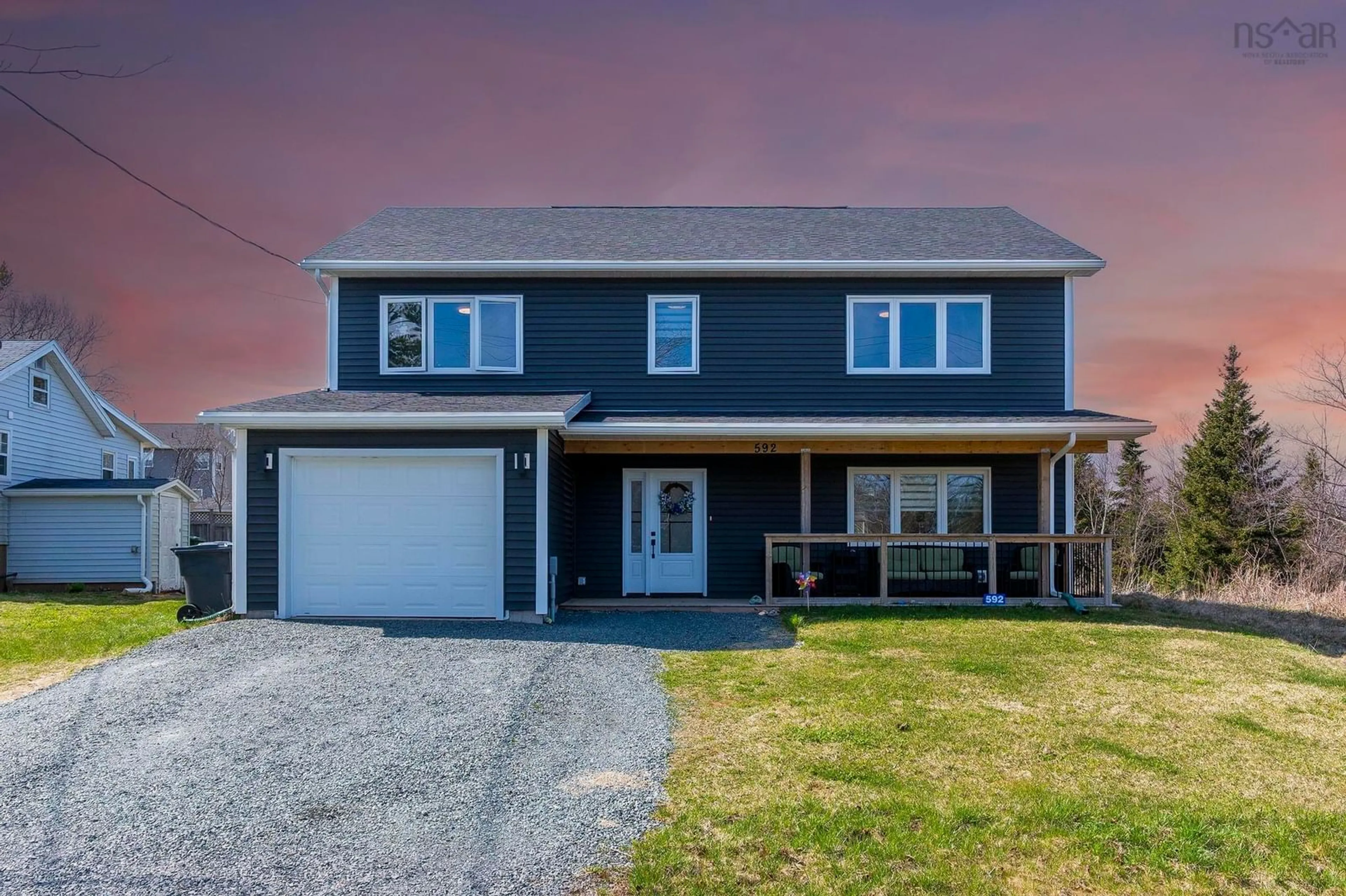 Home with vinyl exterior material, street for 592 Cow Bay Rd, Eastern Passage Nova Scotia B3G 1J6