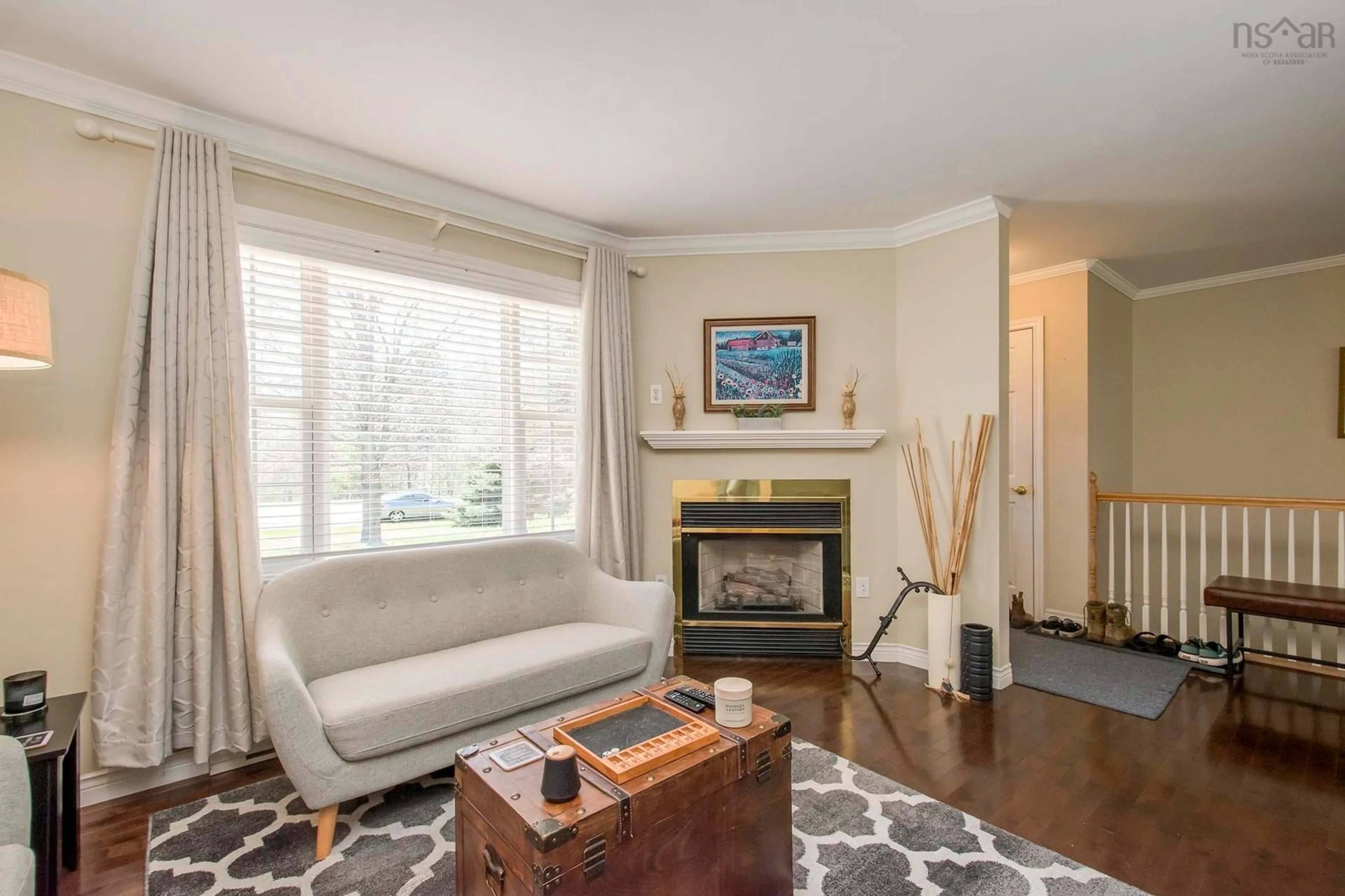 Living room with furniture, wood/laminate floor for 559 Pine Ridge Ave, Kingston Nova Scotia B0P 1R0