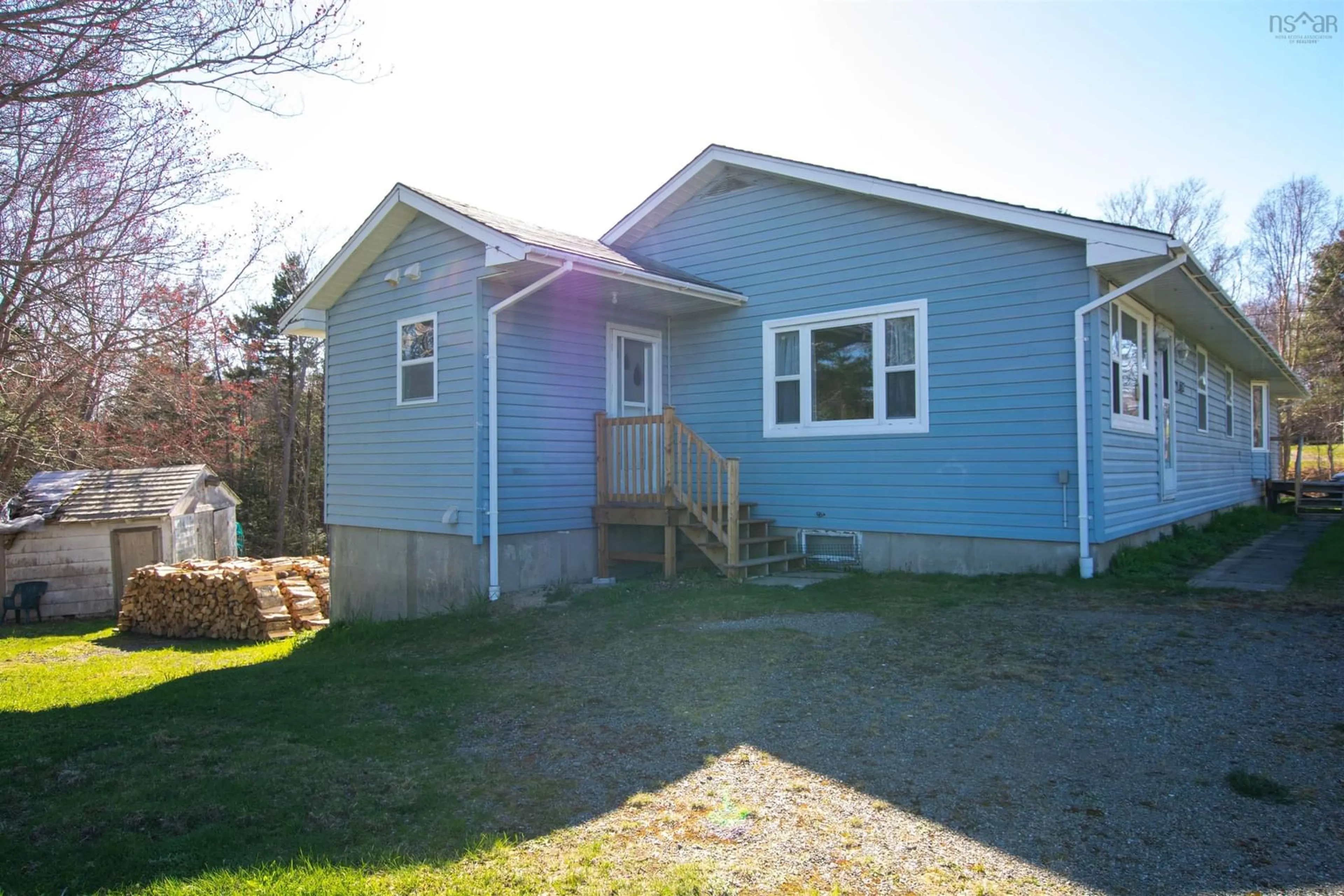Home with vinyl exterior material, street for 1682 Patrice Rd, Concession Nova Scotia B0W 1M0