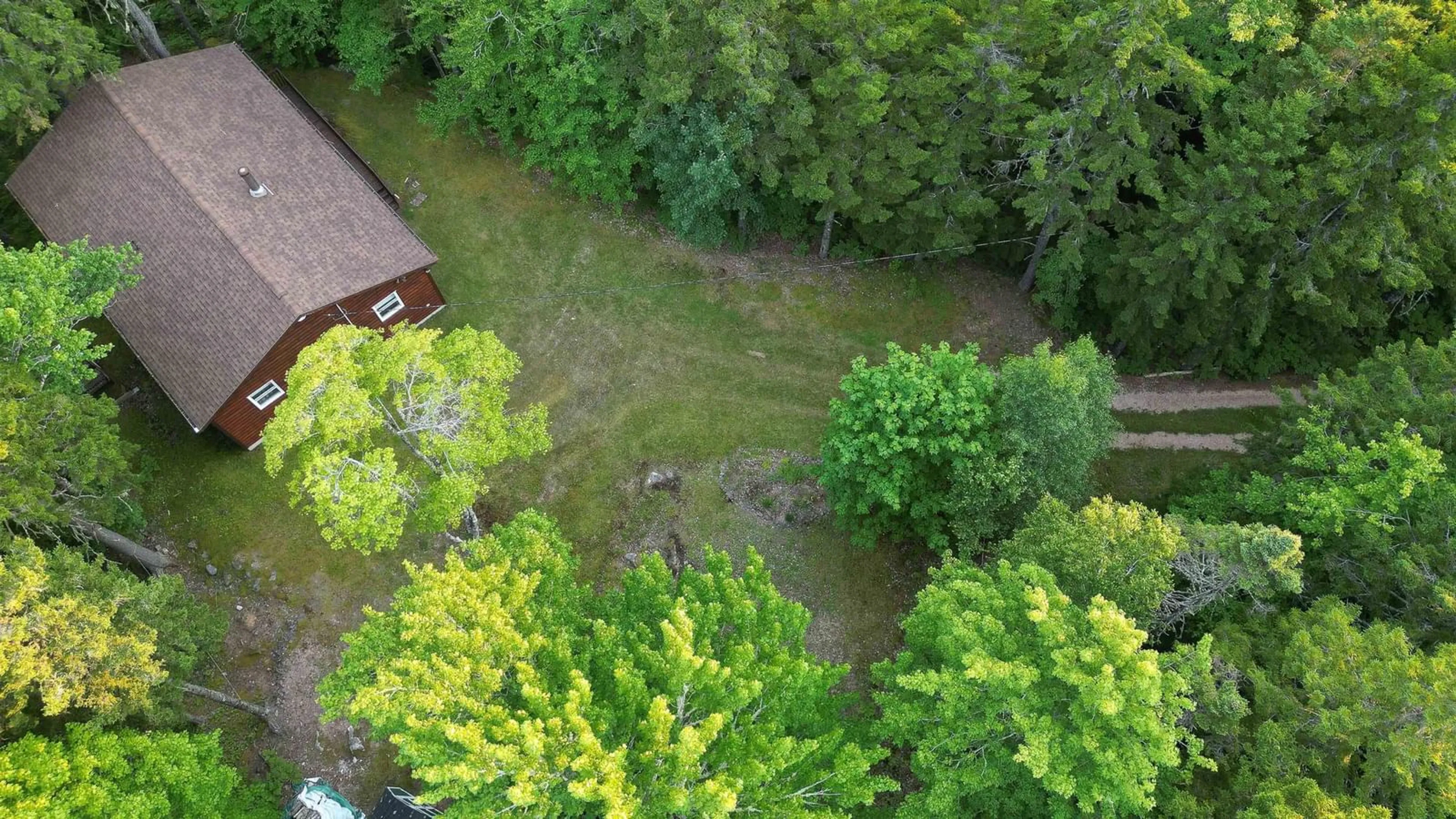 A pic from outside/outdoor area/front of a property/back of a property/a pic from drone, forest/trees view for 65 Eagle Rock Dr, Franey Corner Nova Scotia B0R 1H0