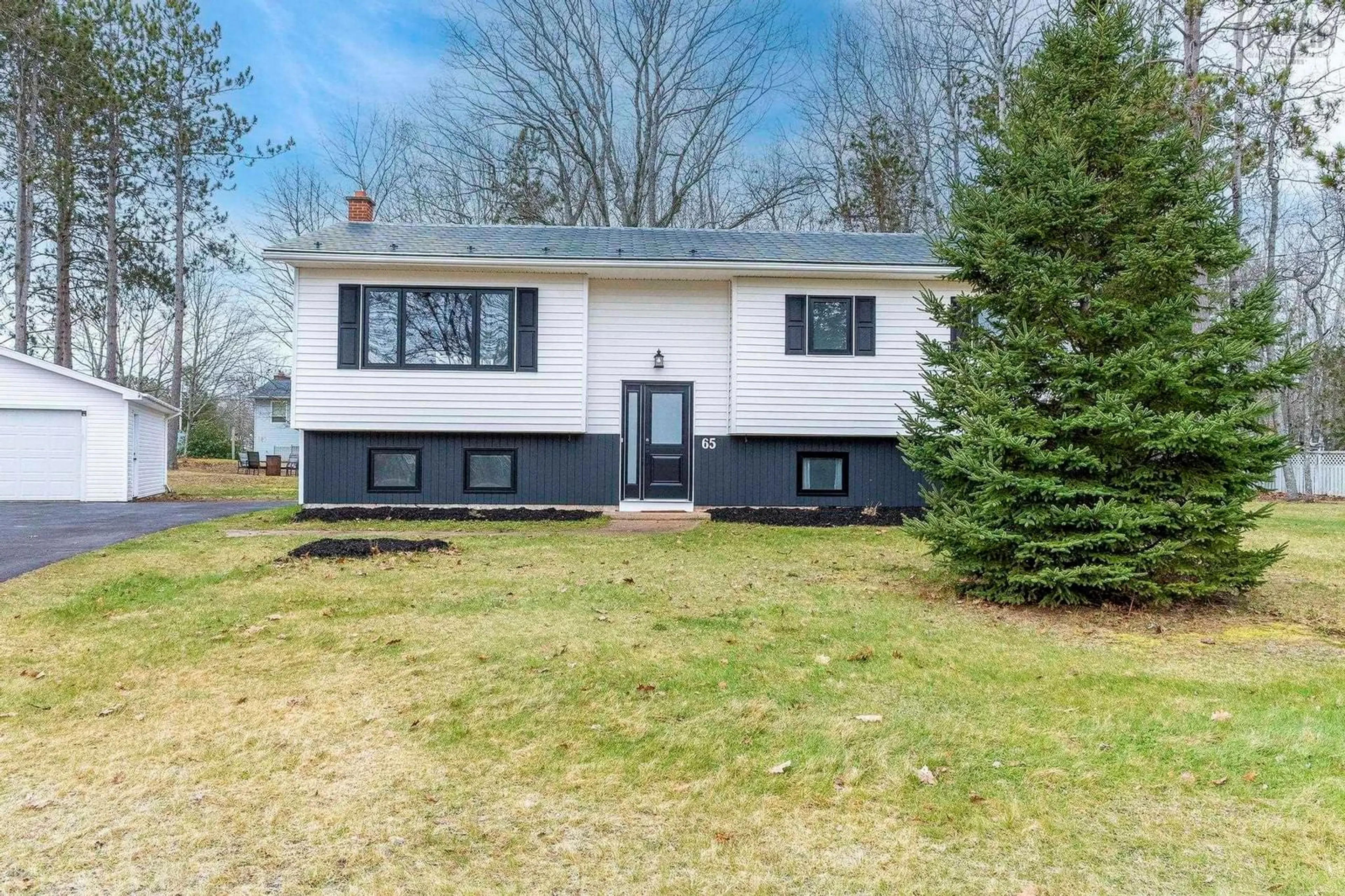Home with vinyl exterior material, street for 65 Valley Rd, Wilmot Nova Scotia B0P 1R0