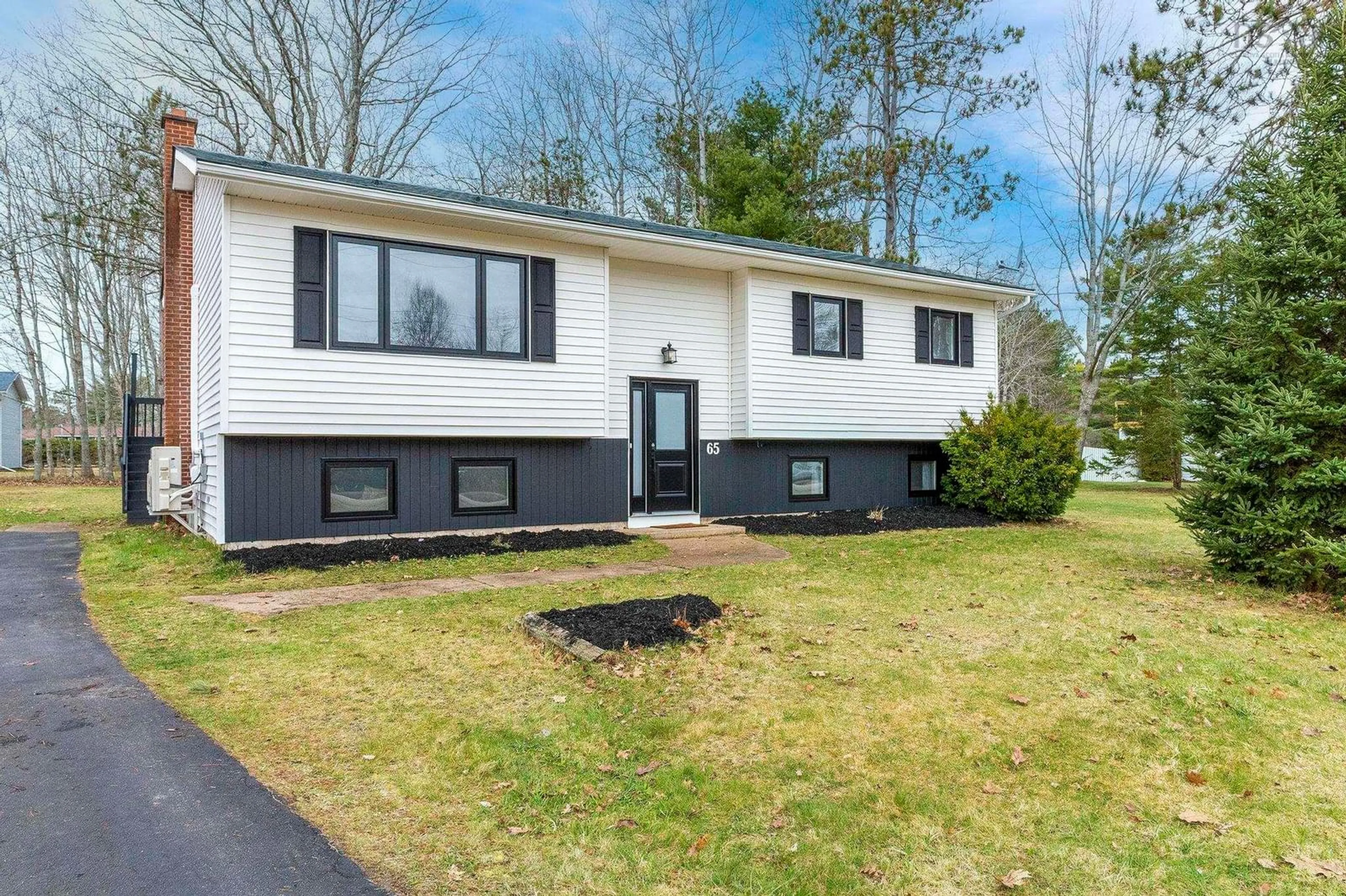 Home with vinyl exterior material, street for 65 Valley Rd, Wilmot Nova Scotia B0P 1R0