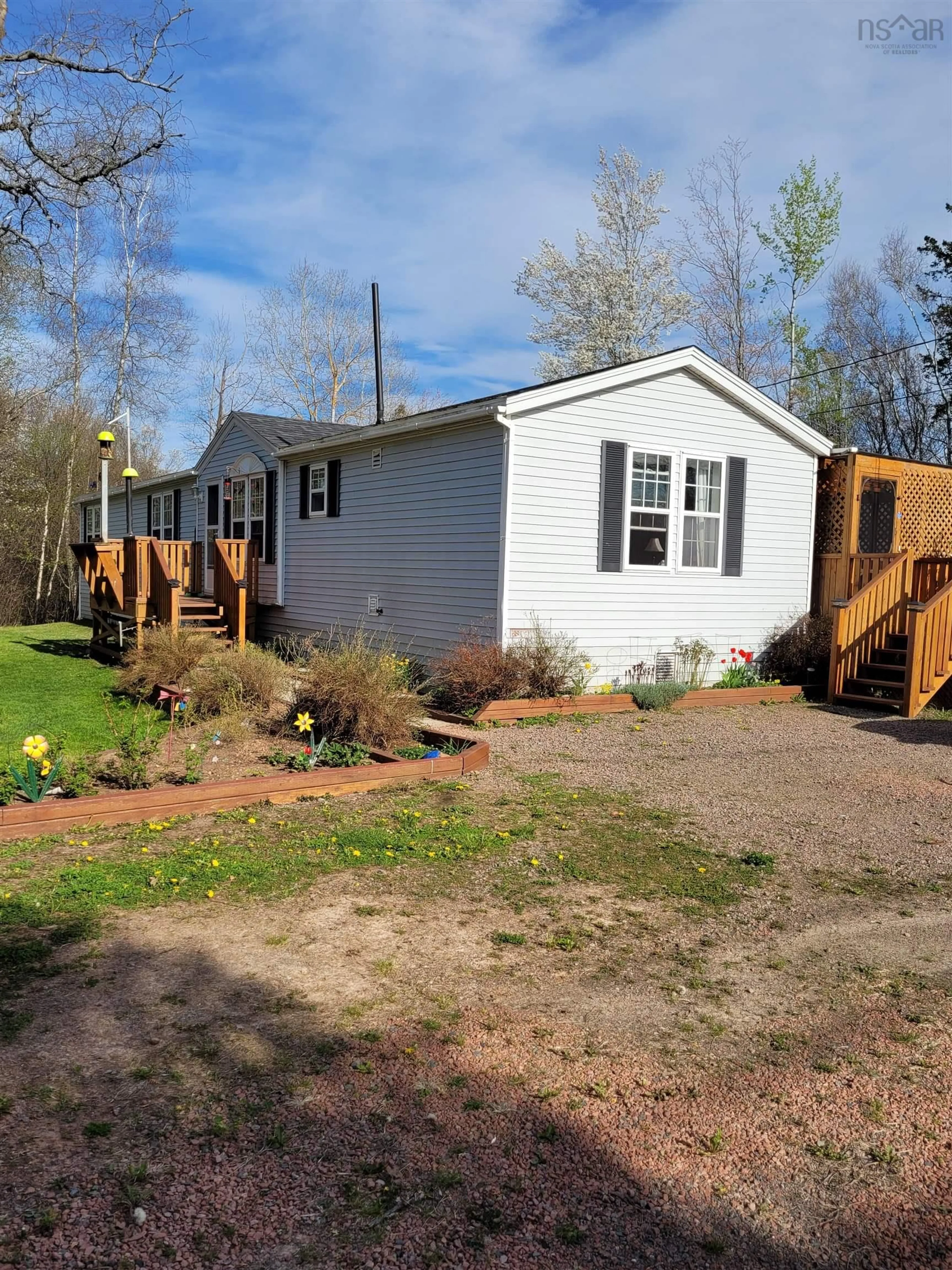 Home with vinyl exterior material, street for 18906 Highway 2, Upper Nappan Nova Scotia B0L 1C0