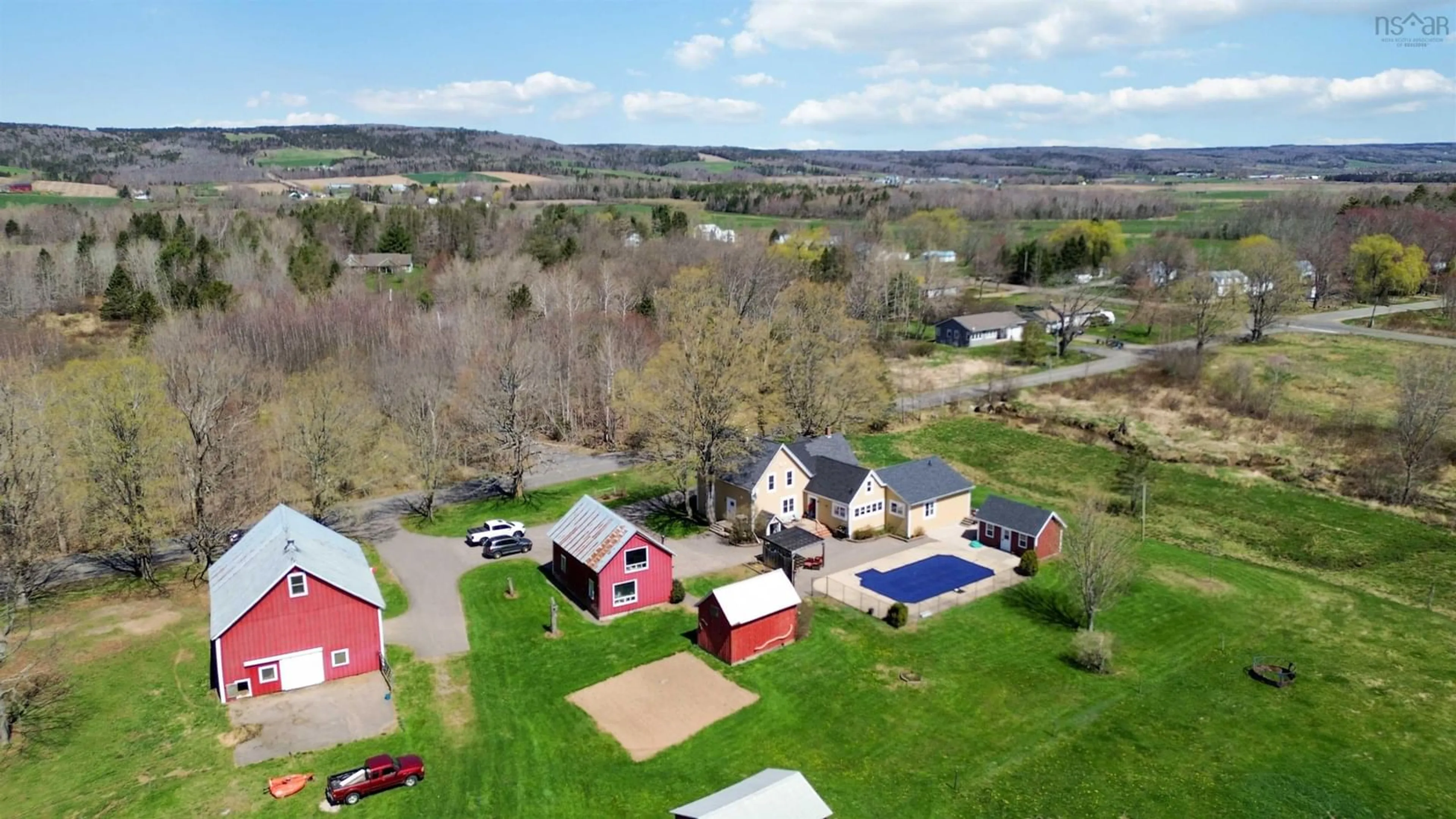 A pic from outside/outdoor area/front of a property/back of a property/a pic from drone, mountain view for 648 Brooklyn St, North Kingston Nova Scotia B0P 1R0