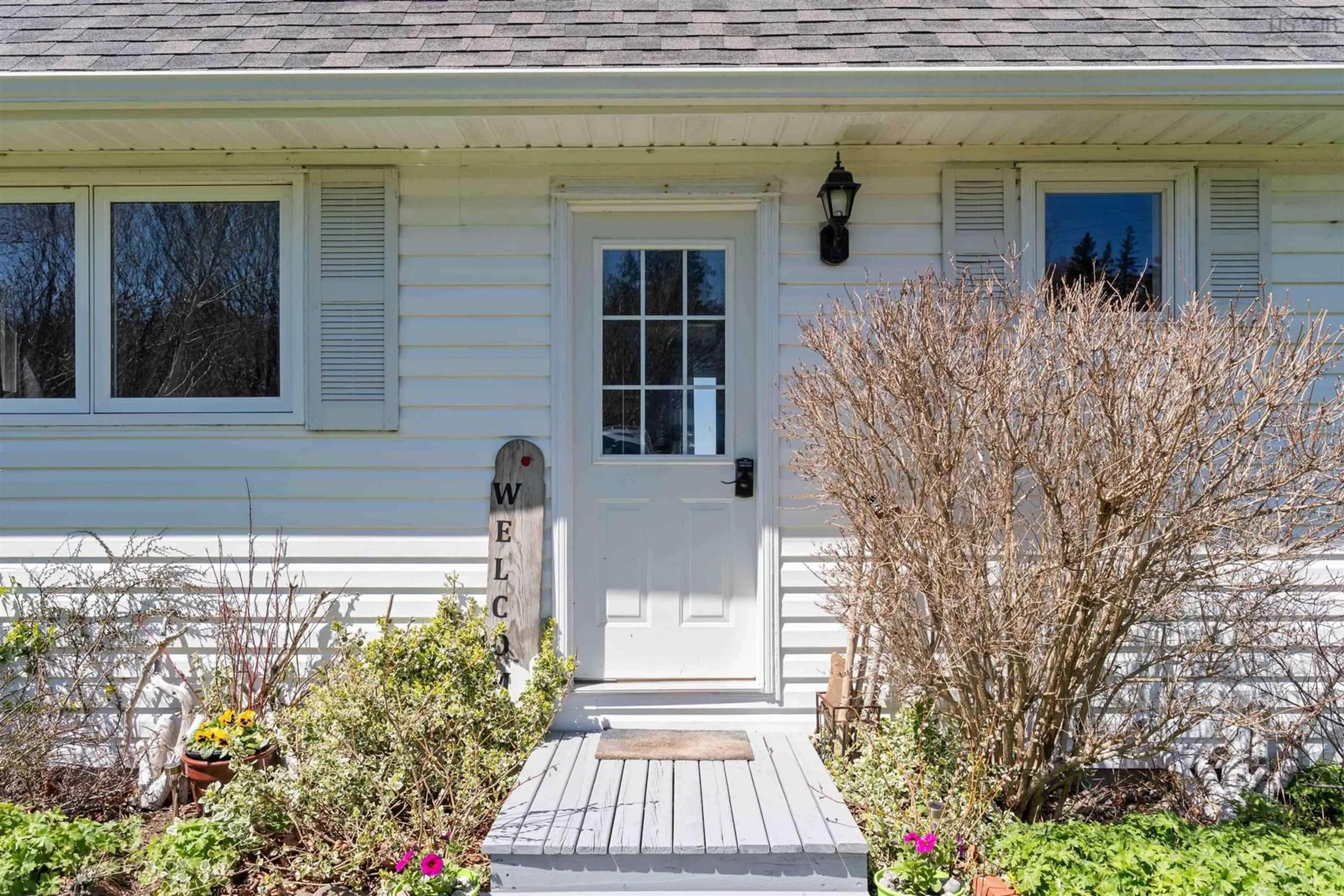 Home with vinyl exterior material, street for 5015 Shore Road West, Parkers Cove Nova Scotia B0S 1A0