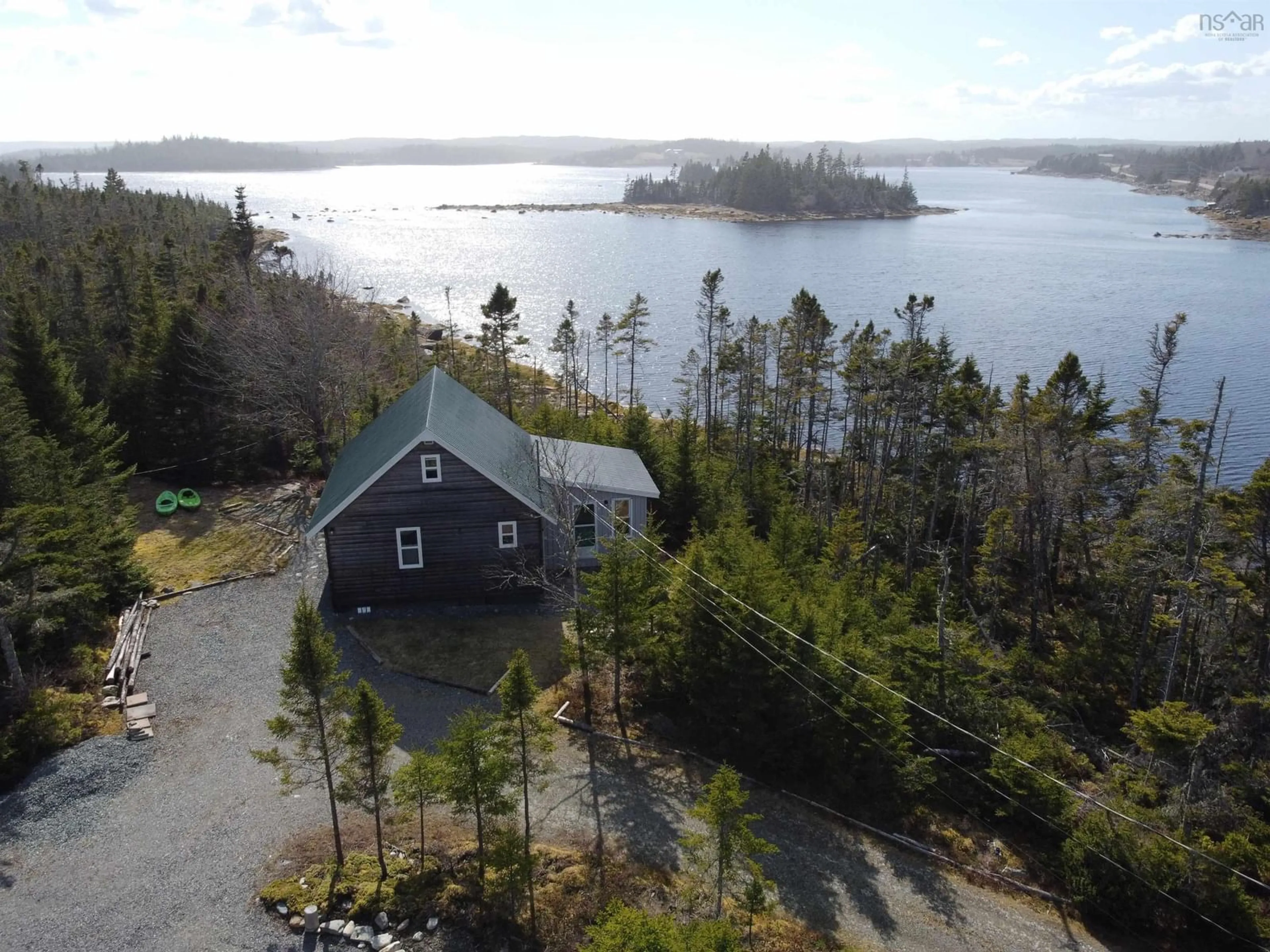 A pic from outside/outdoor area/front of a property/back of a property/a pic from drone, water/lake/river/ocean view for 4818 Highway 7, Liscomb Nova Scotia B0J 2G0