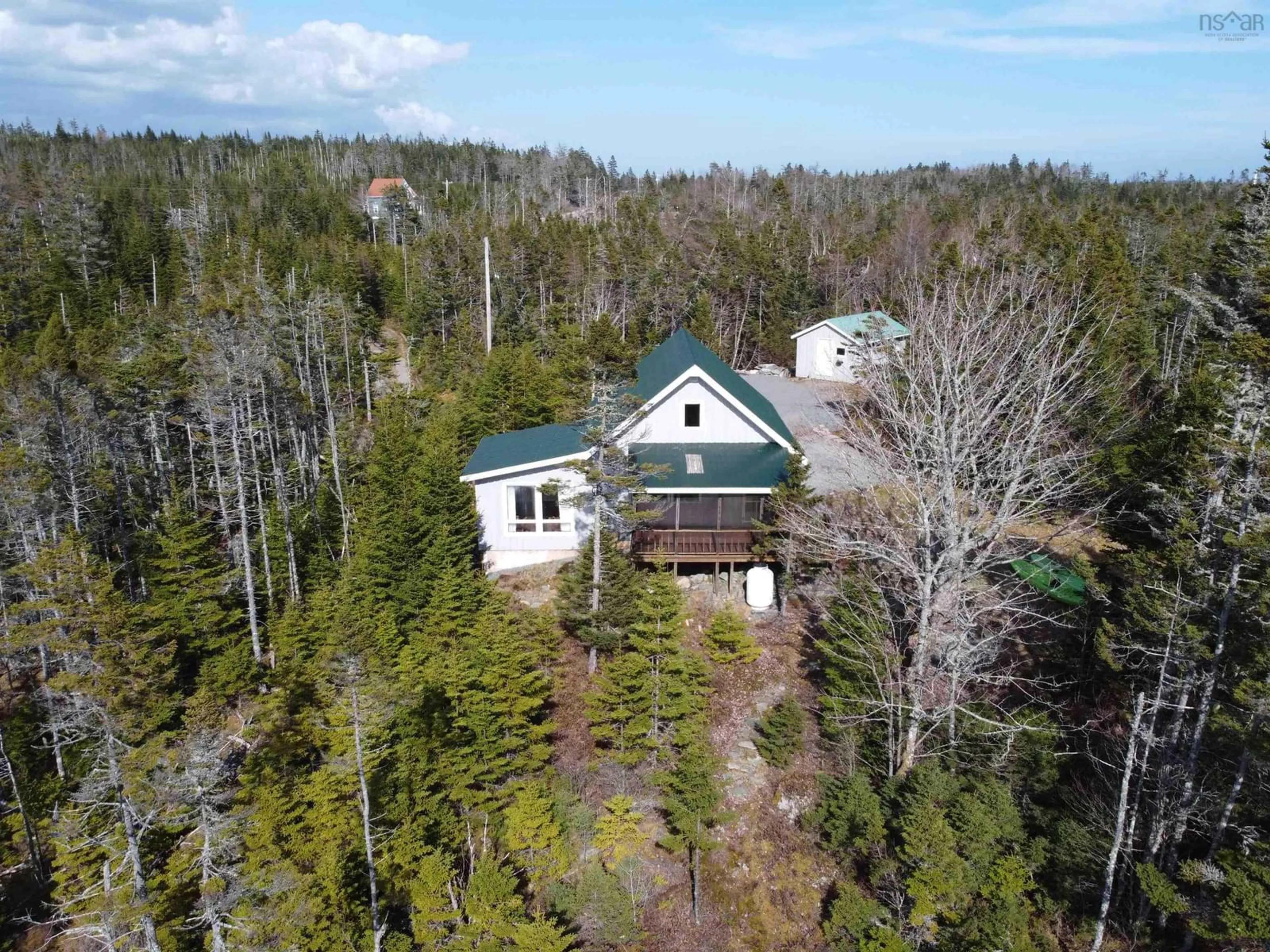 A pic from outside/outdoor area/front of a property/back of a property/a pic from drone, forest/trees view for 4818 Highway 7, Liscomb Nova Scotia B0J 2G0