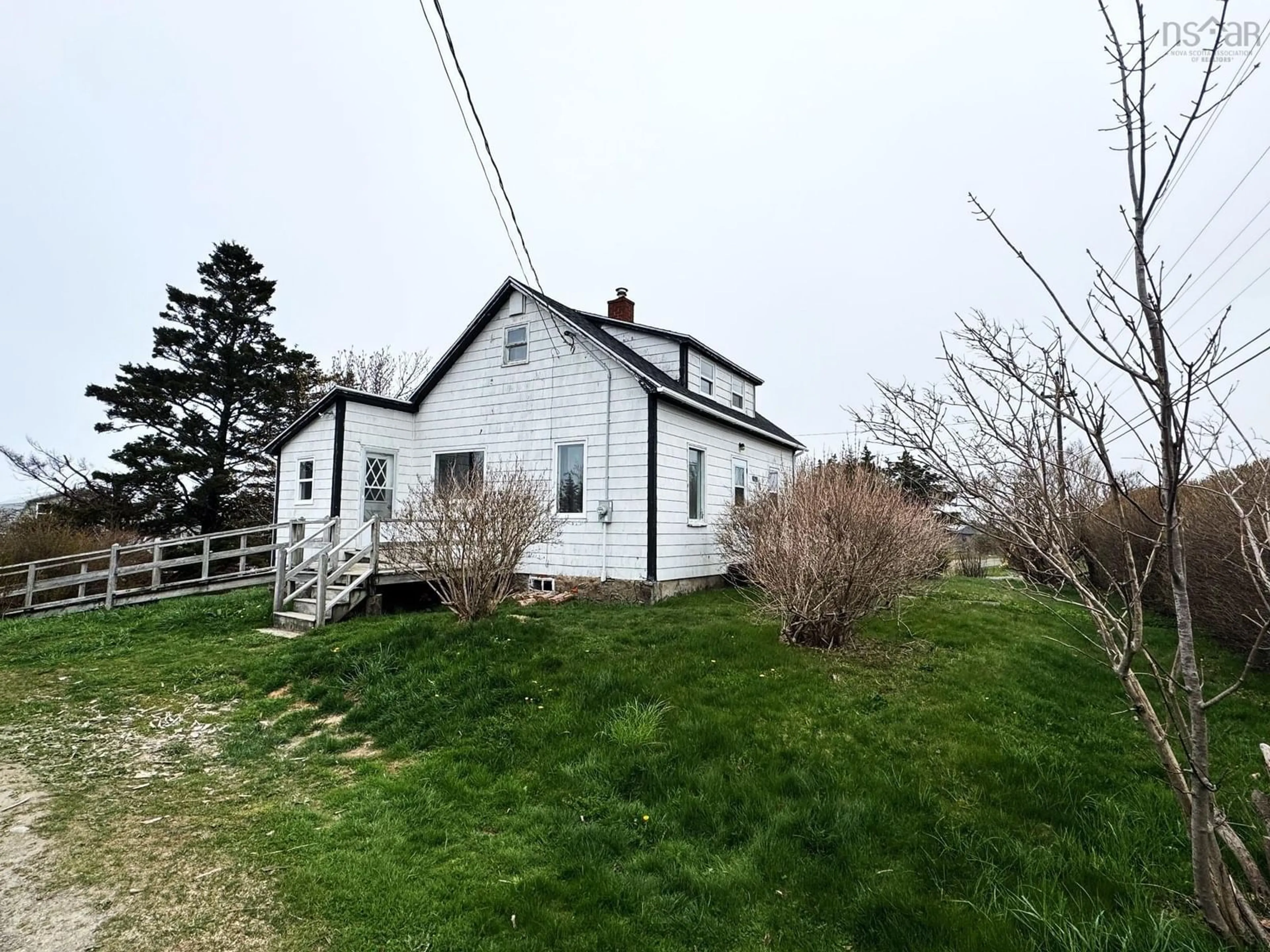 A pic from outside/outdoor area/front of a property/back of a property/a pic from drone, building for 7821 Highway 1, Meteghan Nova Scotia B0W 2J0