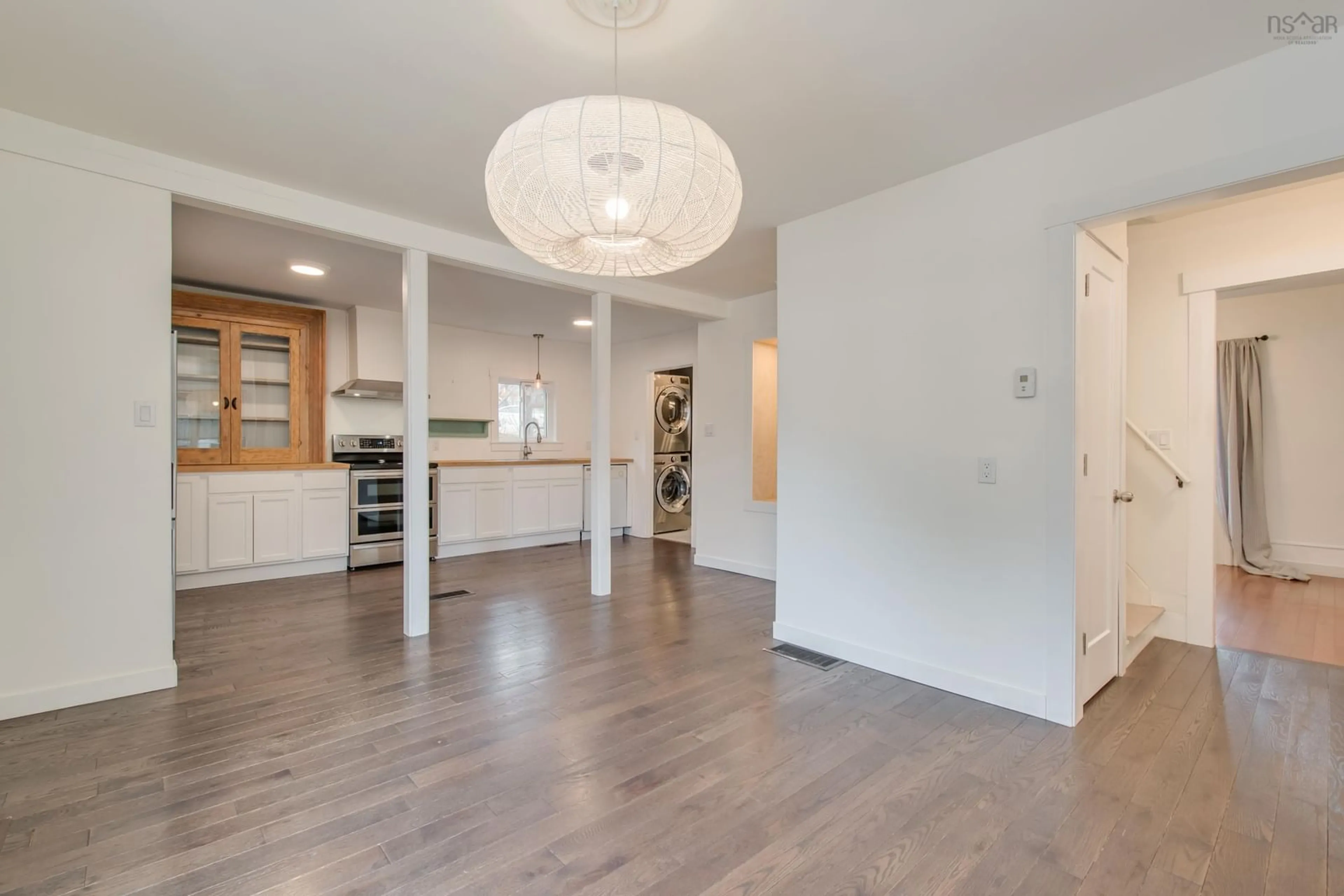 Open concept kitchen, wood/laminate floor for 7484 Highway 3, Martins River Nova Scotia B0J 2E0