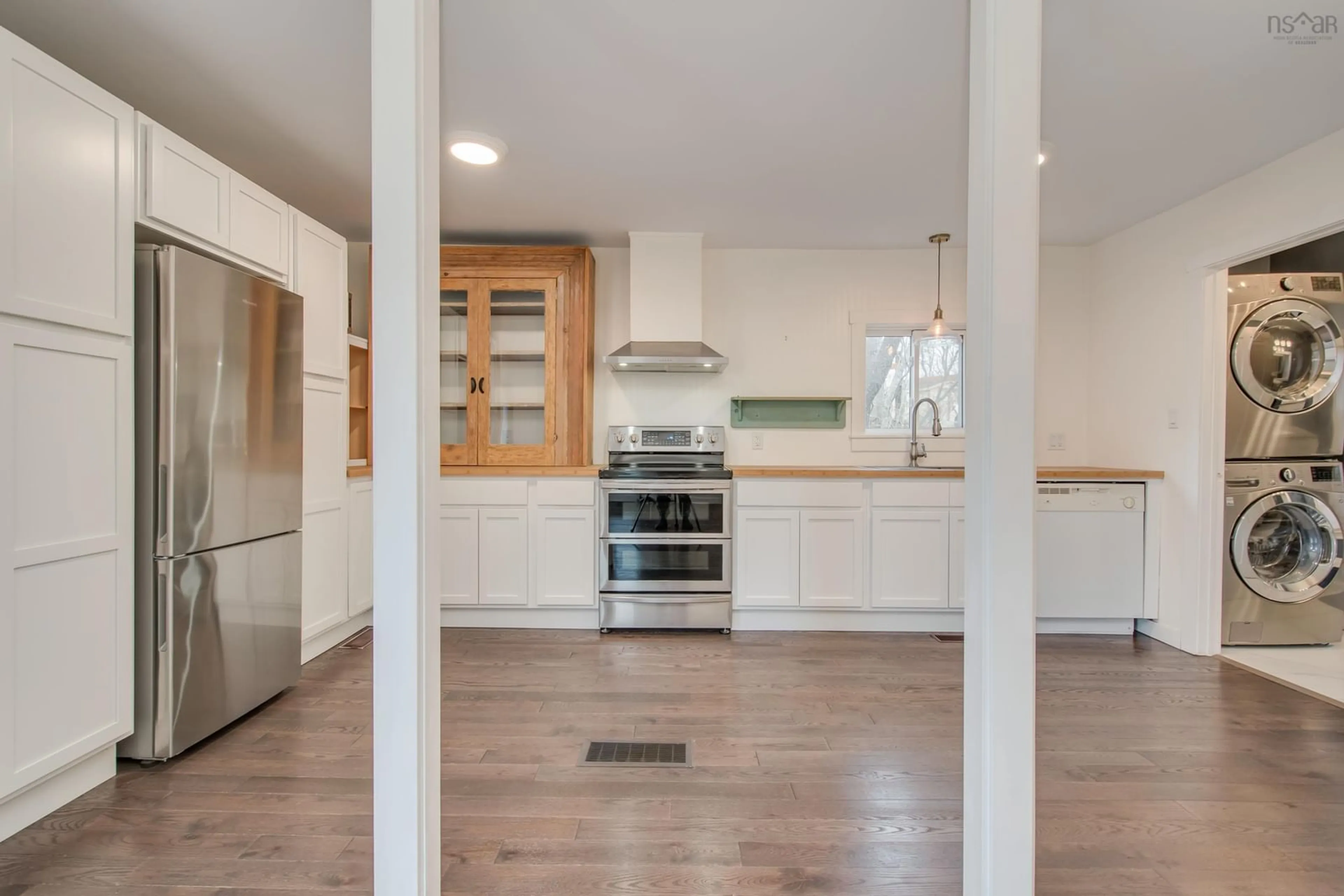 Open concept kitchen, wood/laminate floor for 7484 Highway 3, Martins River Nova Scotia B0J 2E0