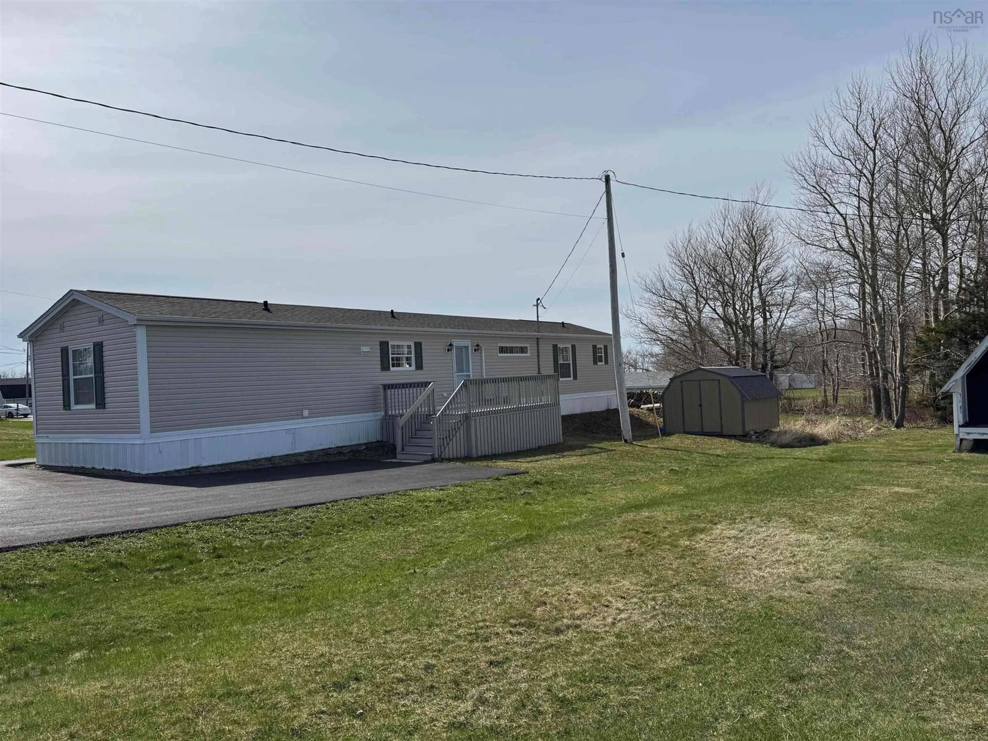 A pic from outside/outdoor area/front of a property/back of a property/a pic from drone, unknown for 15 Macleod St, Inverness Nova Scotia B0E 1N0