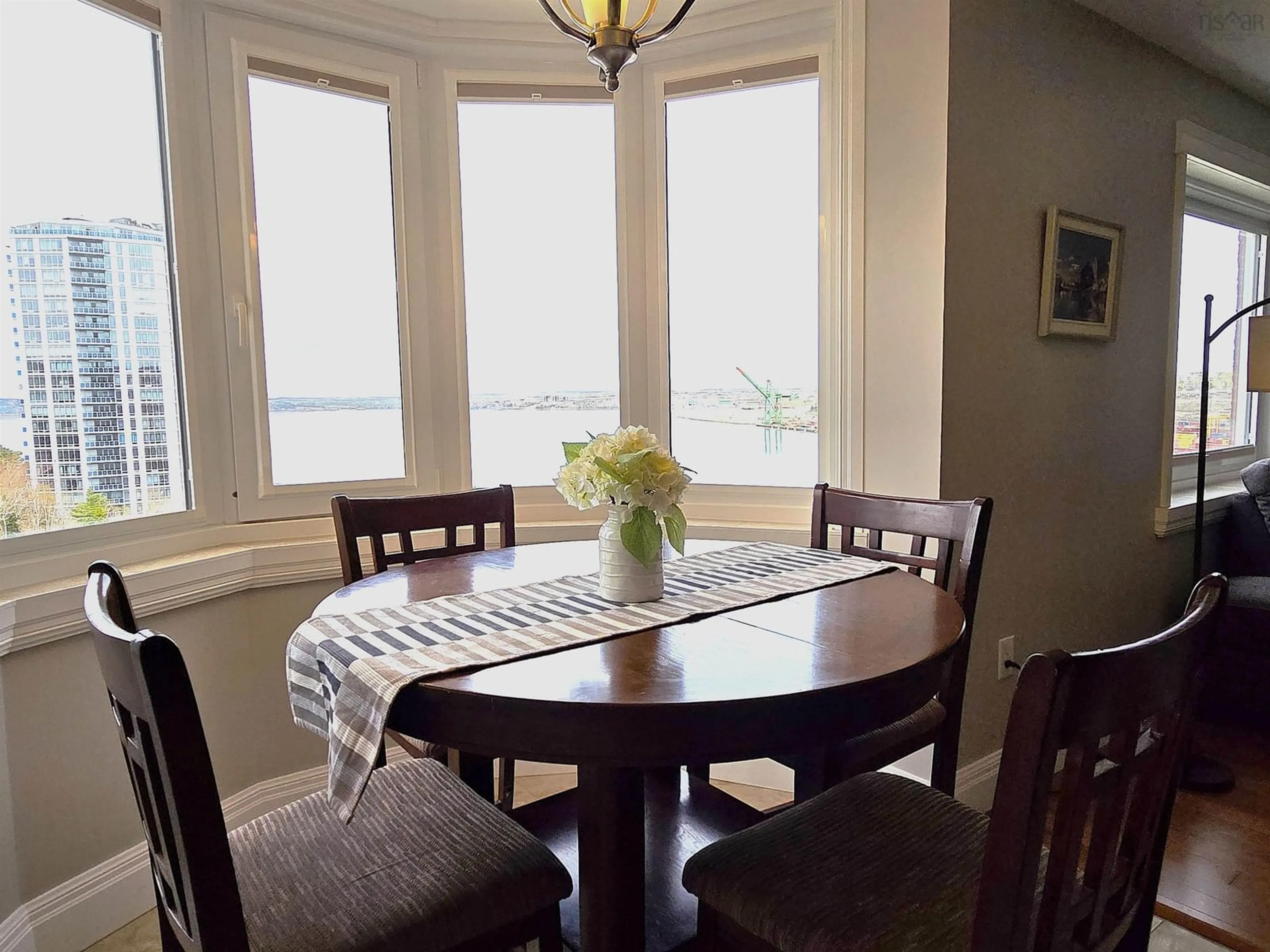 Dining room, wood/laminate floor for 45 Vimy Ave #719, Halifax Nova Scotia B3M 4C5