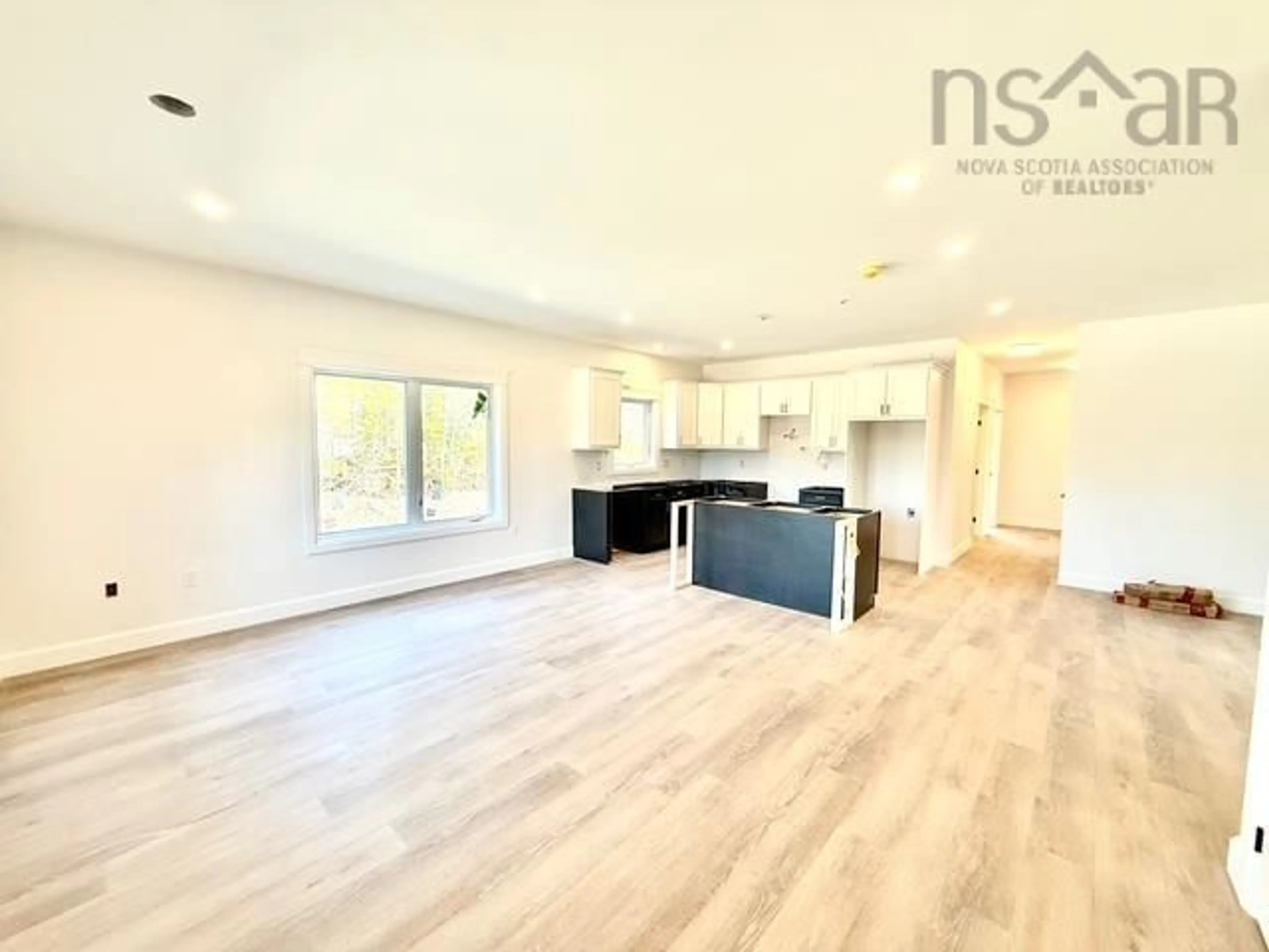 Open concept kitchen, wood/laminate floor for 121 Grandview Terr, East Uniacke Nova Scotia B0N 1Z0