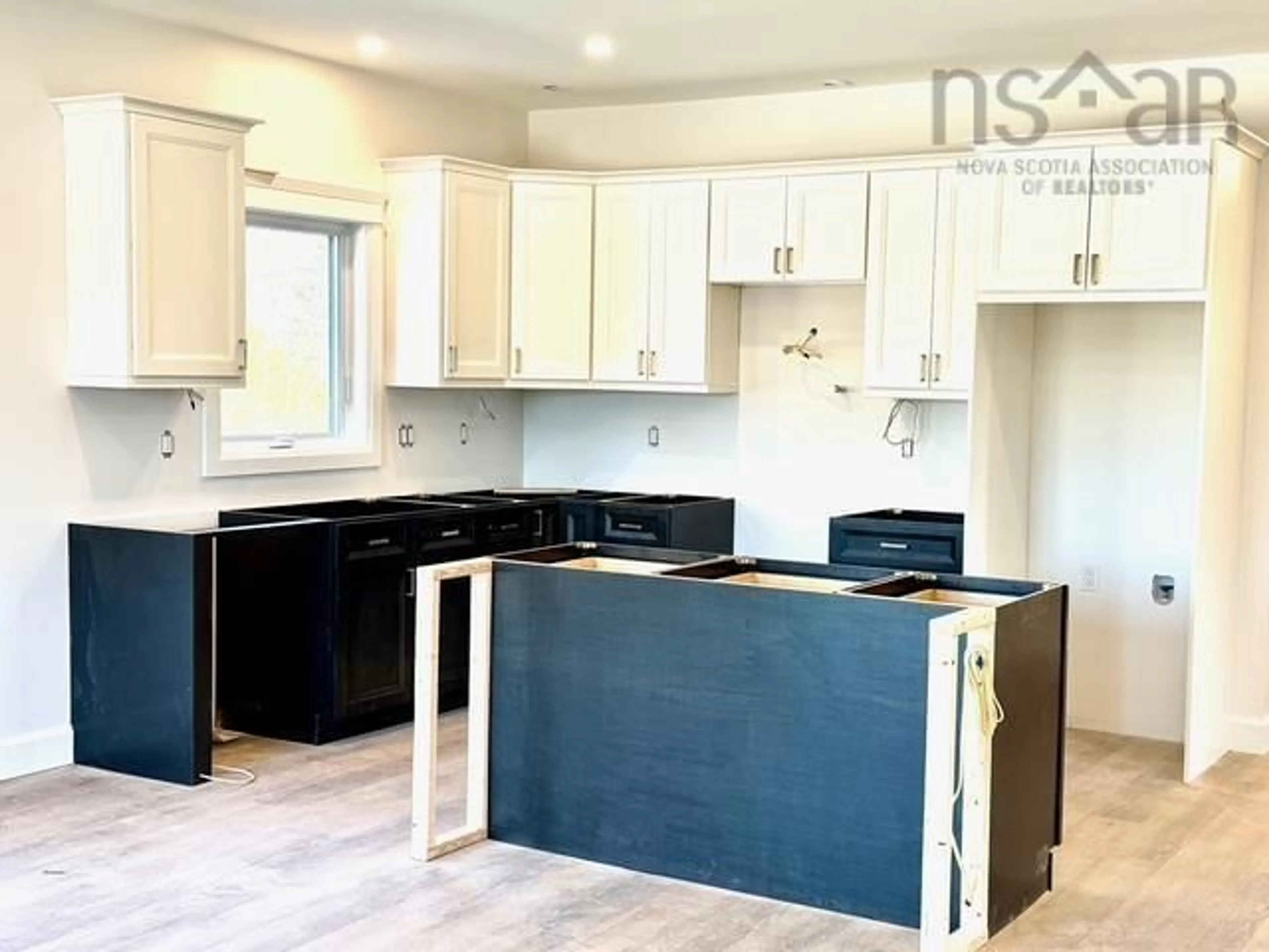 Open concept kitchen, wood/laminate floor for 121 Grandview Terr, East Uniacke Nova Scotia B0N 1Z0