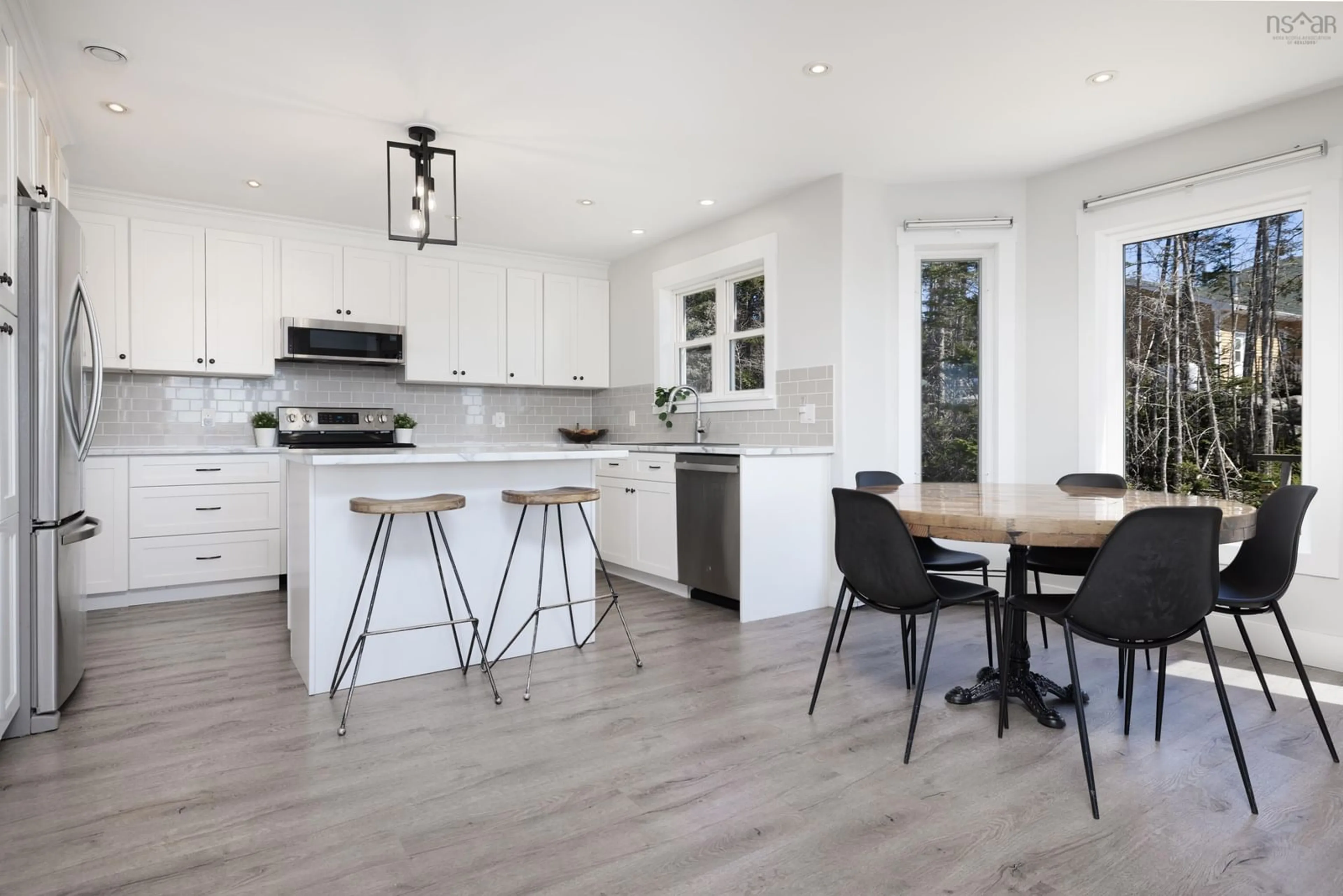 Open concept kitchen, wood/laminate floor for 251 Greenough Drive, Porters Lake Nova Scotia B3E 1M8