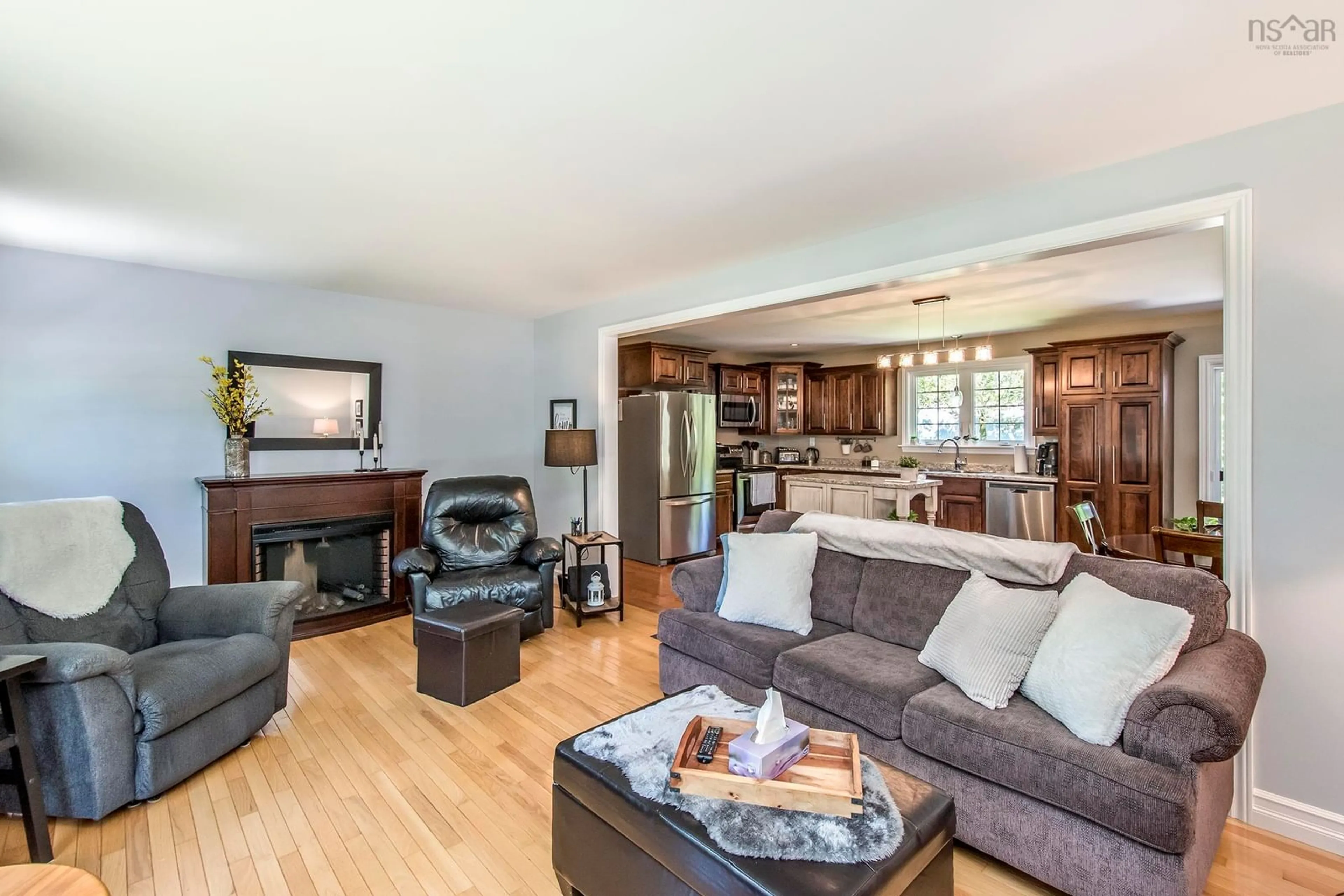Living room with furniture, wood/laminate floor for 255 Virginia Rd, Virginia East Nova Scotia B0S 1G0