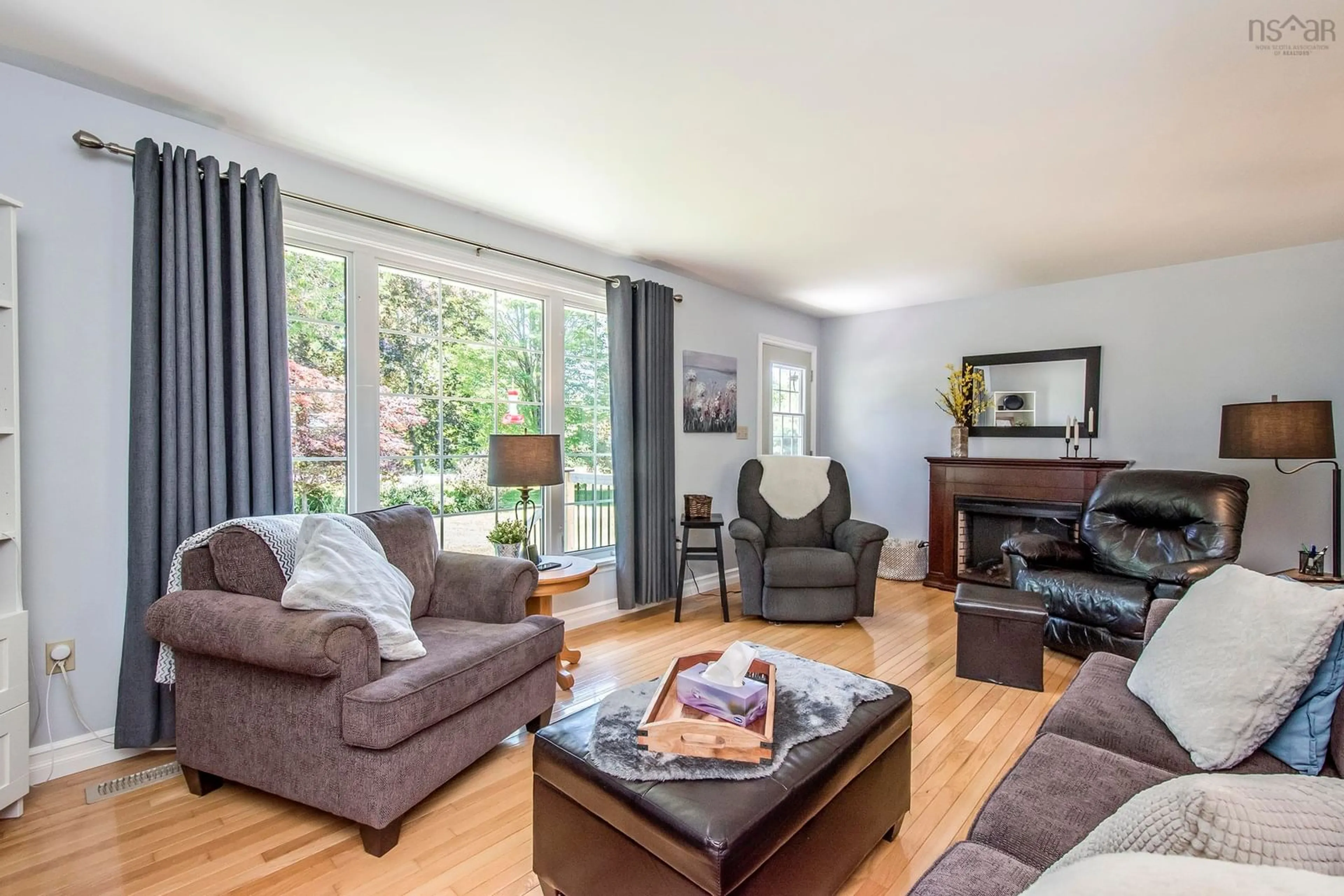 Living room with furniture, wood/laminate floor for 255 Virginia Rd, Virginia East Nova Scotia B0S 1G0