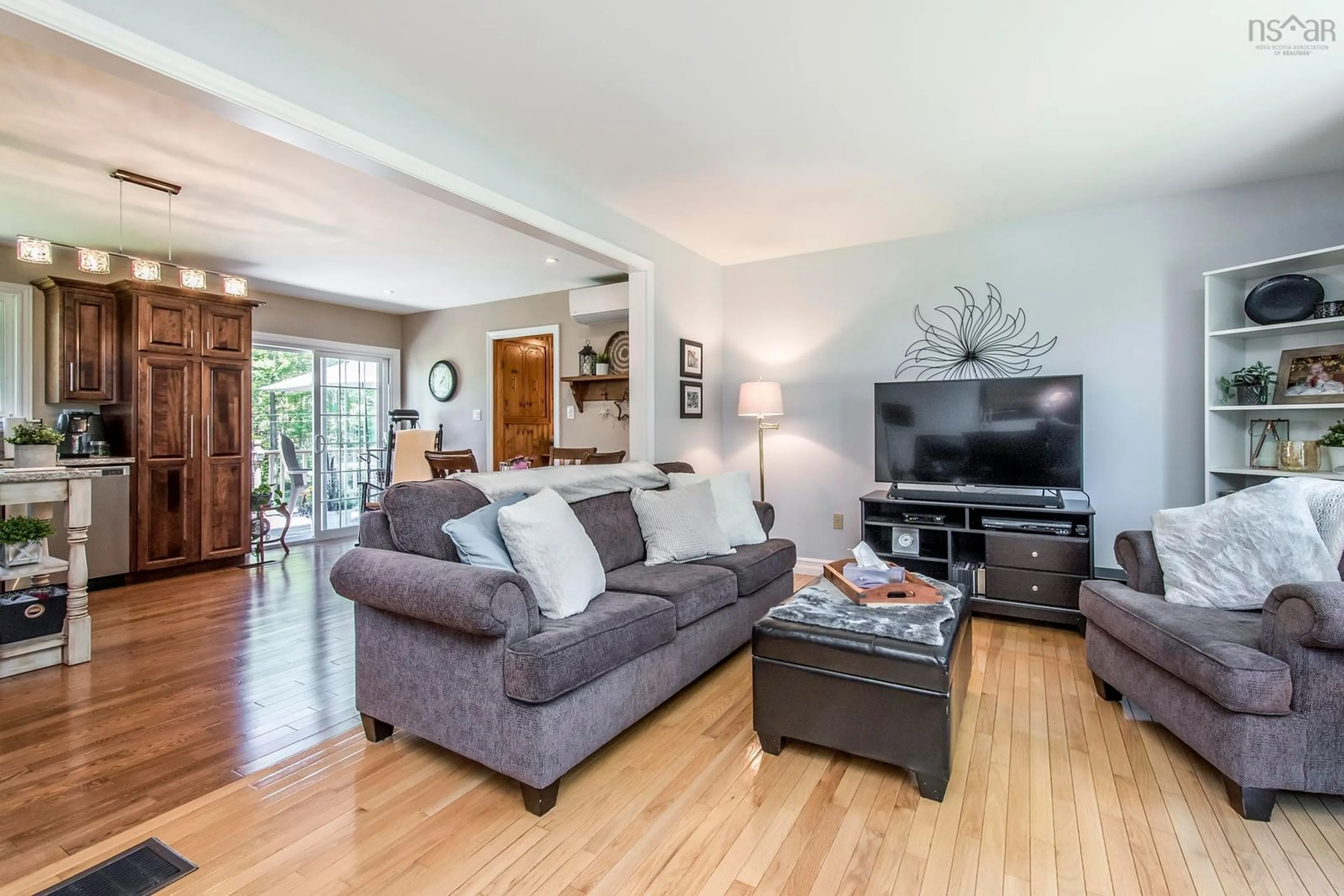 Living room with furniture, wood/laminate floor for 255 Virginia Rd, Virginia East Nova Scotia B0S 1G0