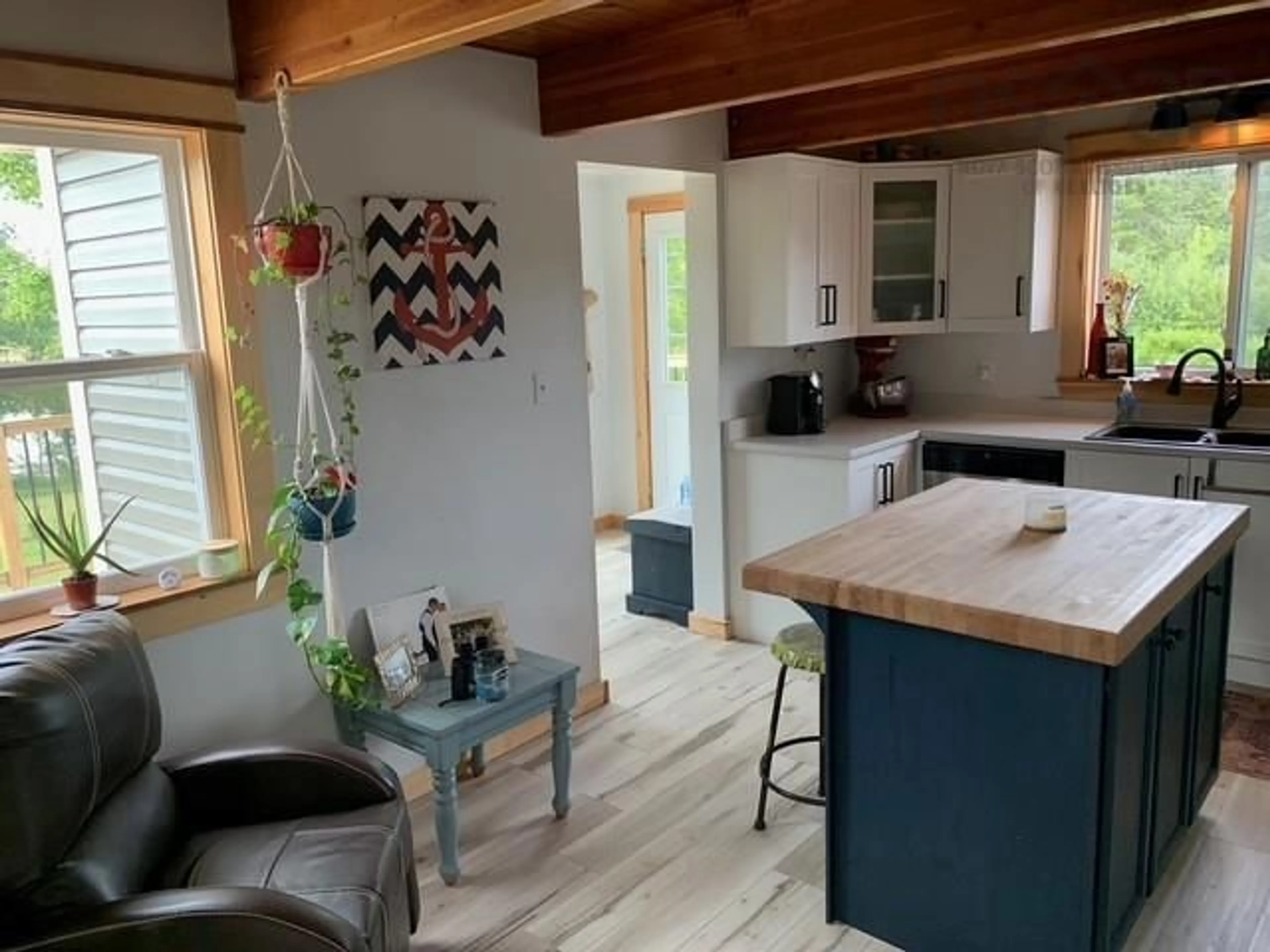 Open concept kitchen, wood/laminate floor for 139 Cemetery Rd, River John Nova Scotia B0K 1N0