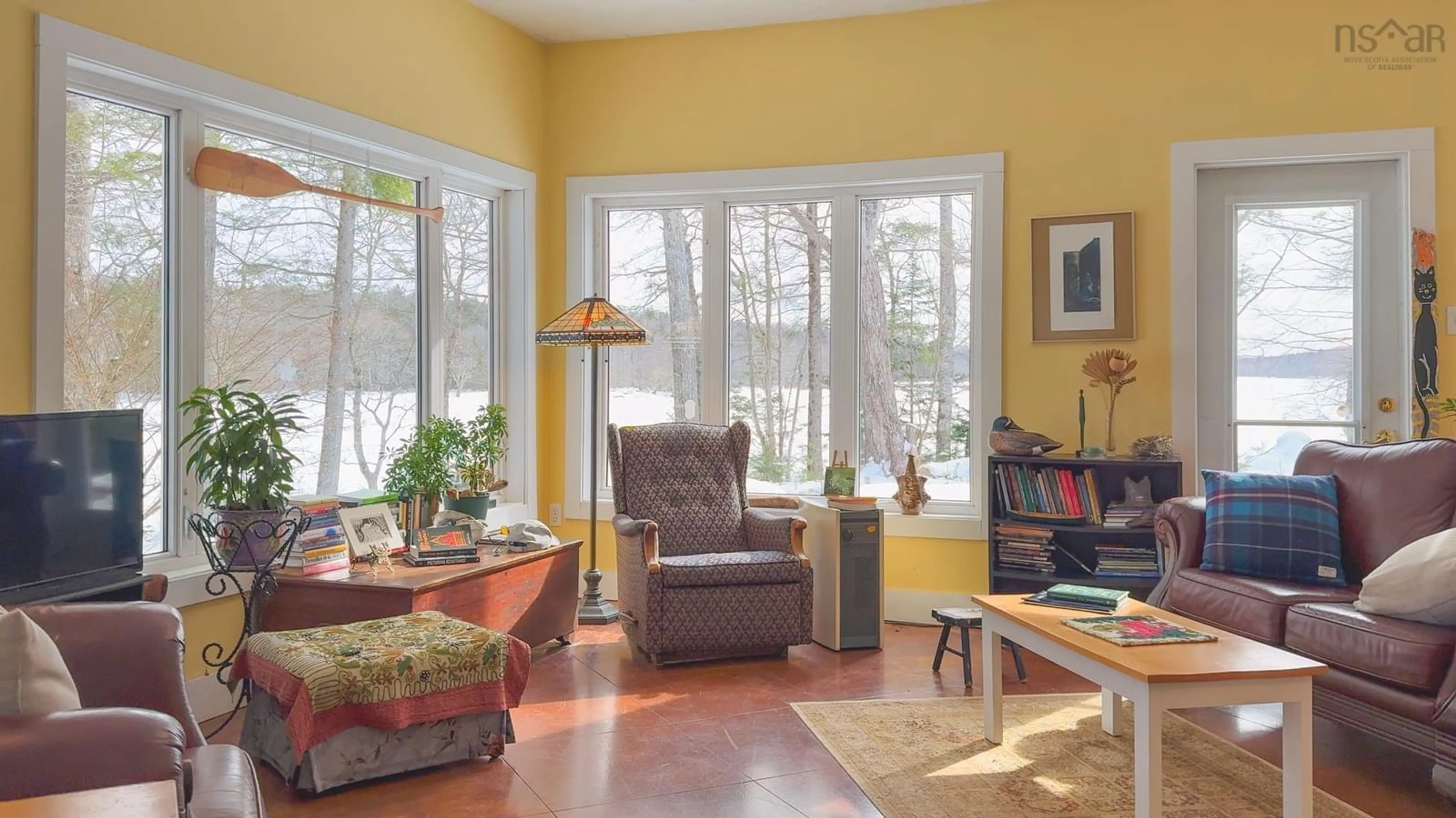 Living room with furniture, wood/laminate floor for 1542 Canaan Road Rd, Canaan Nova Scotia B0W 3M0