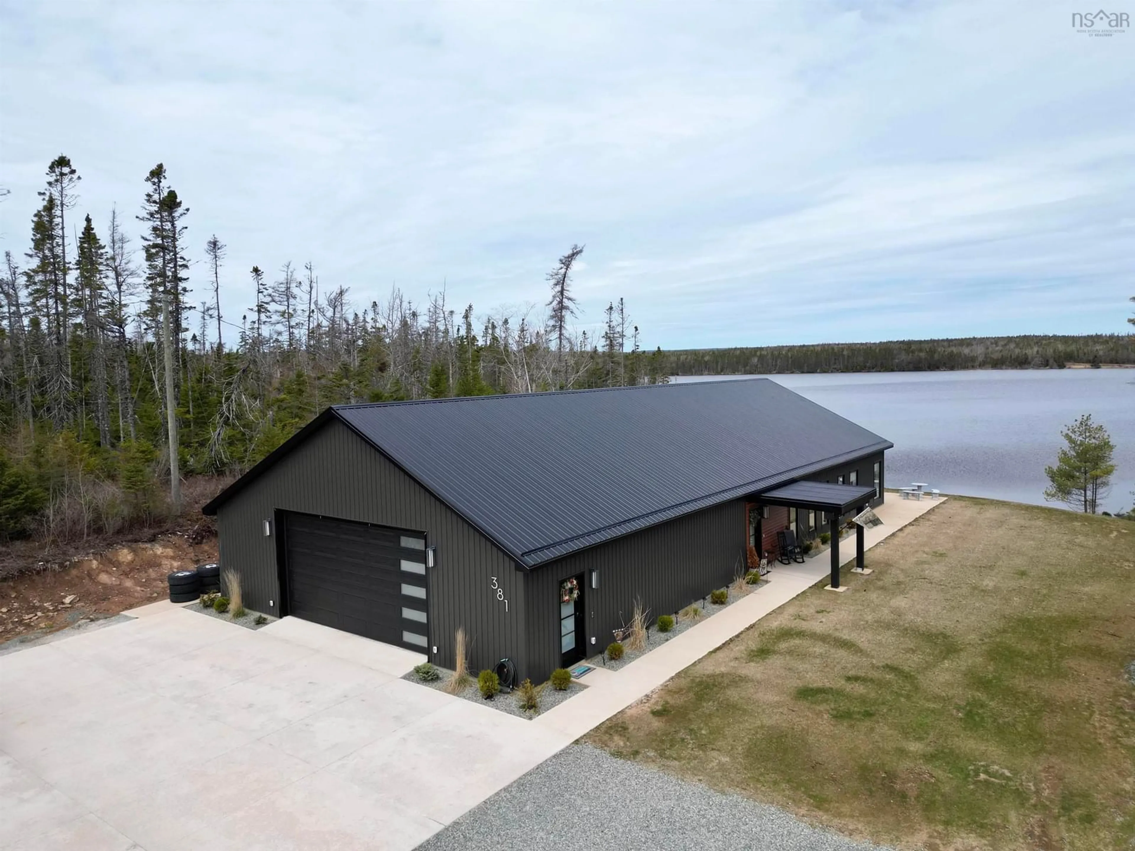 A pic from outside/outdoor area/front of a property/back of a property/a pic from drone, water/lake/river/ocean view for 381 Grandiqe Ferry Rd, Louisdale Nova Scotia B0E 1V0