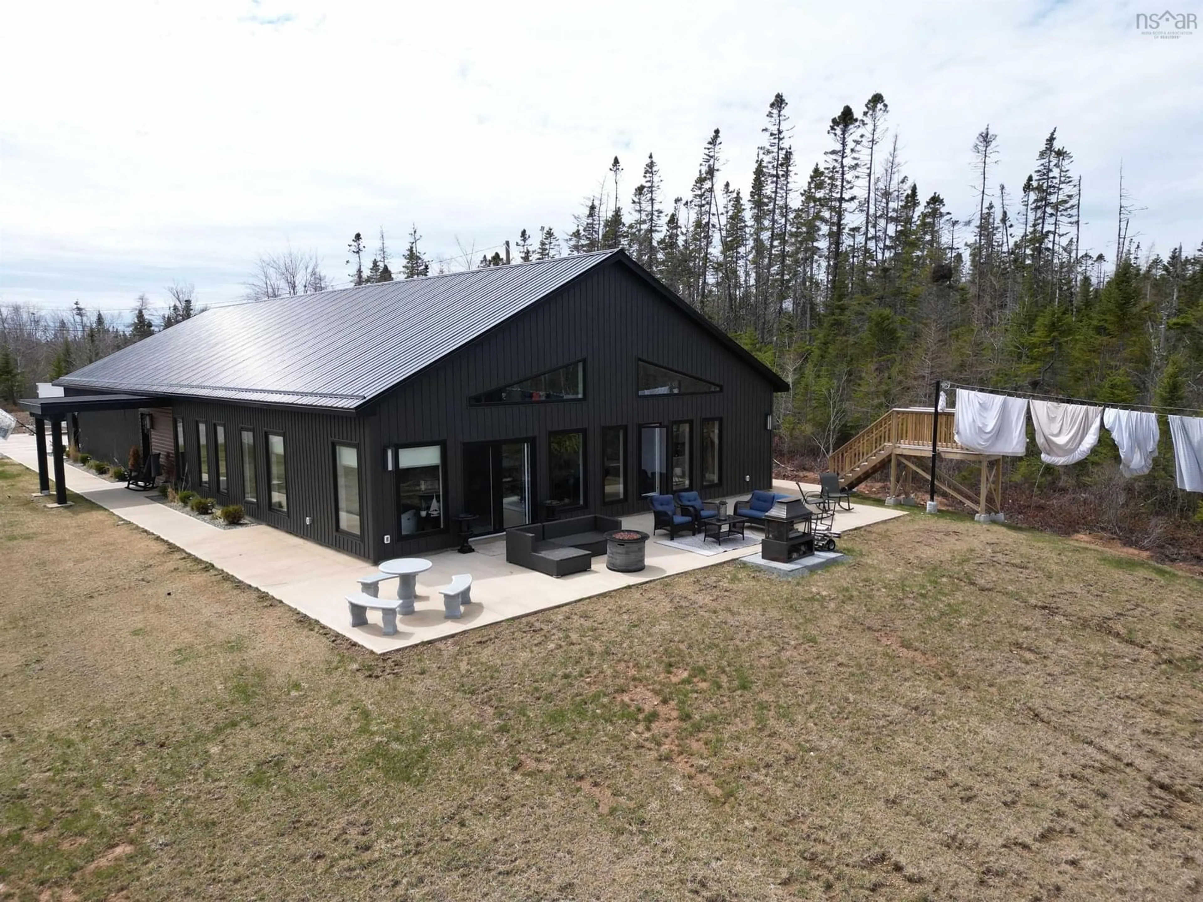 A pic from outside/outdoor area/front of a property/back of a property/a pic from drone, mountain view for 381 Grandiqe Ferry Rd, Louisdale Nova Scotia B0E 1V0