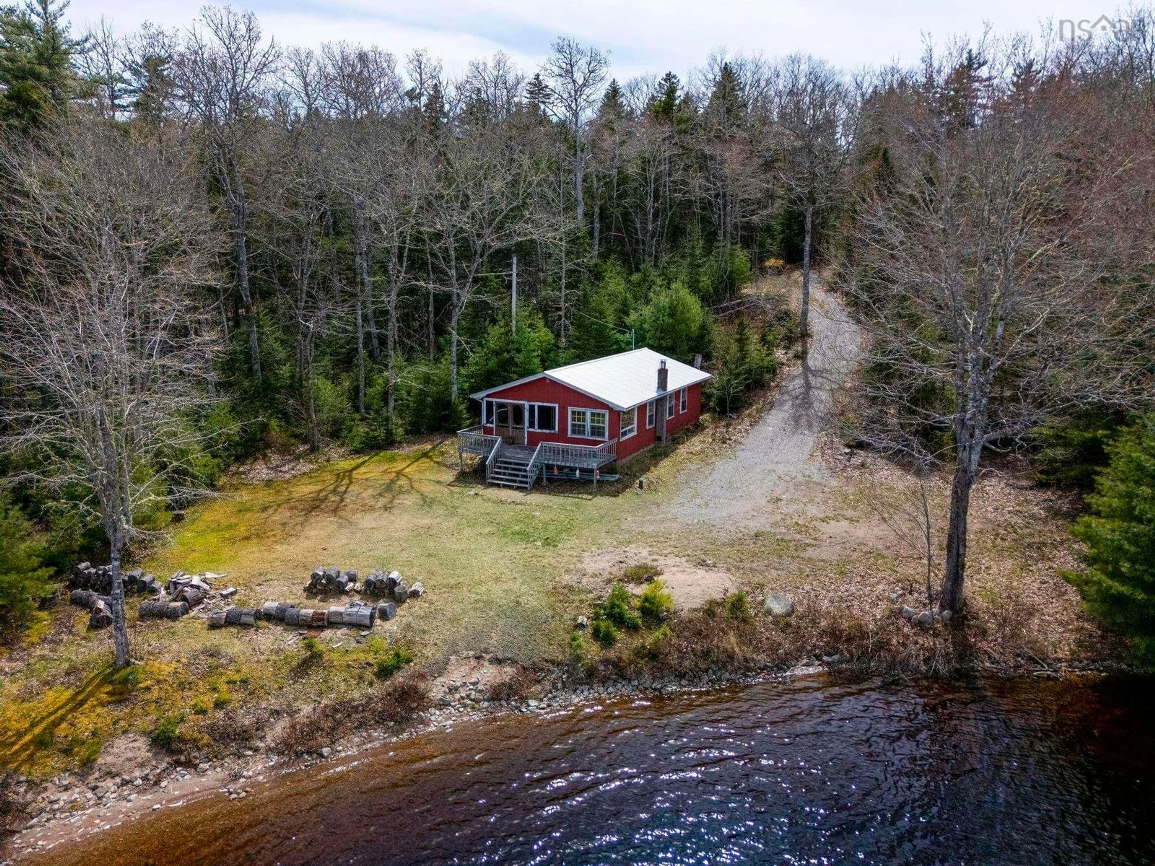 A pic from outside/outdoor area/front of a property/back of a property/a pic from drone, water/lake/river/ocean view for 1060 Trout Lake Rd, New Albany Nova Scotia B0S 1P0