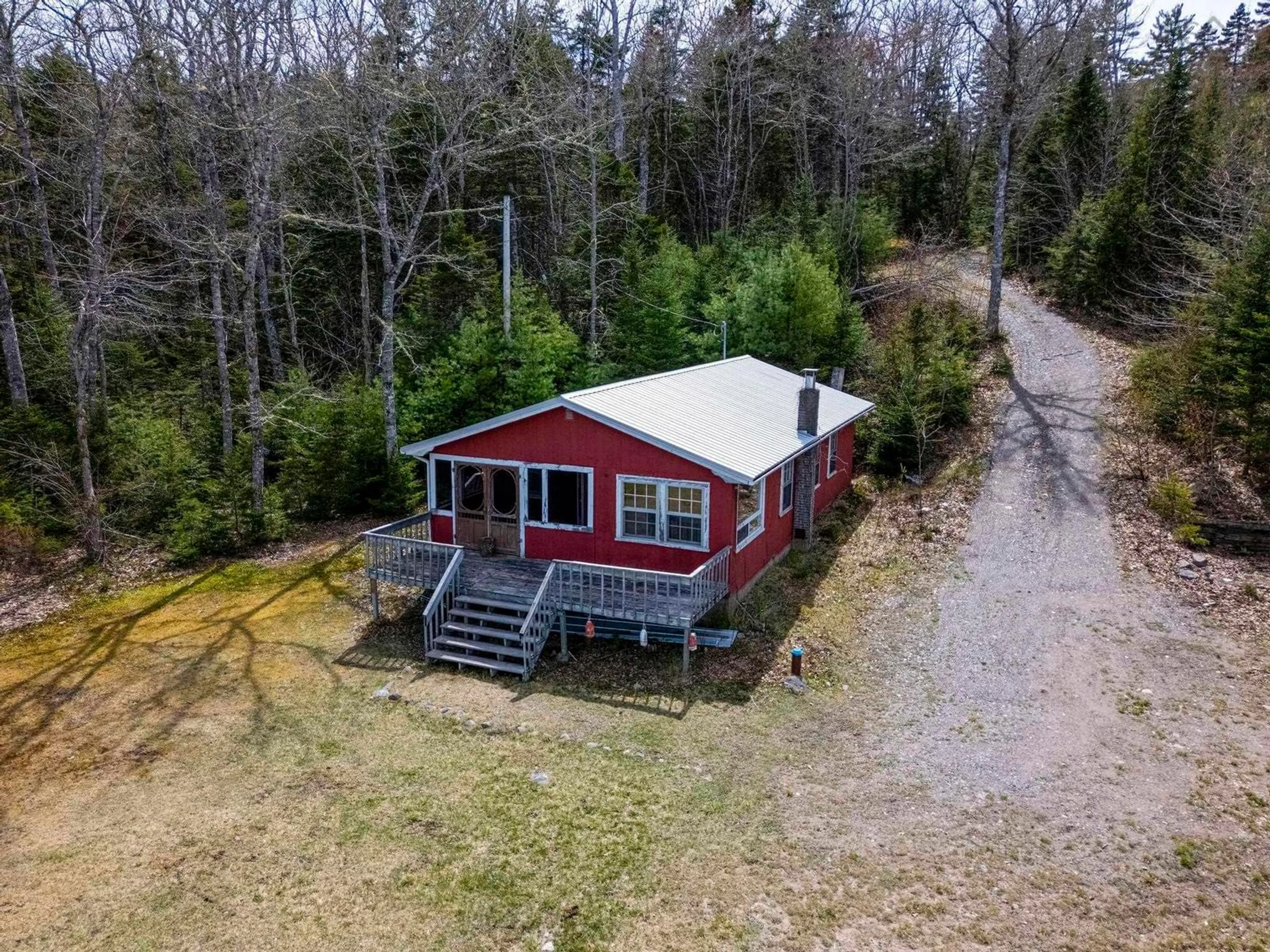 A pic from outside/outdoor area/front of a property/back of a property/a pic from drone, unknown for 1060 Trout Lake Rd, New Albany Nova Scotia B0S 1P0