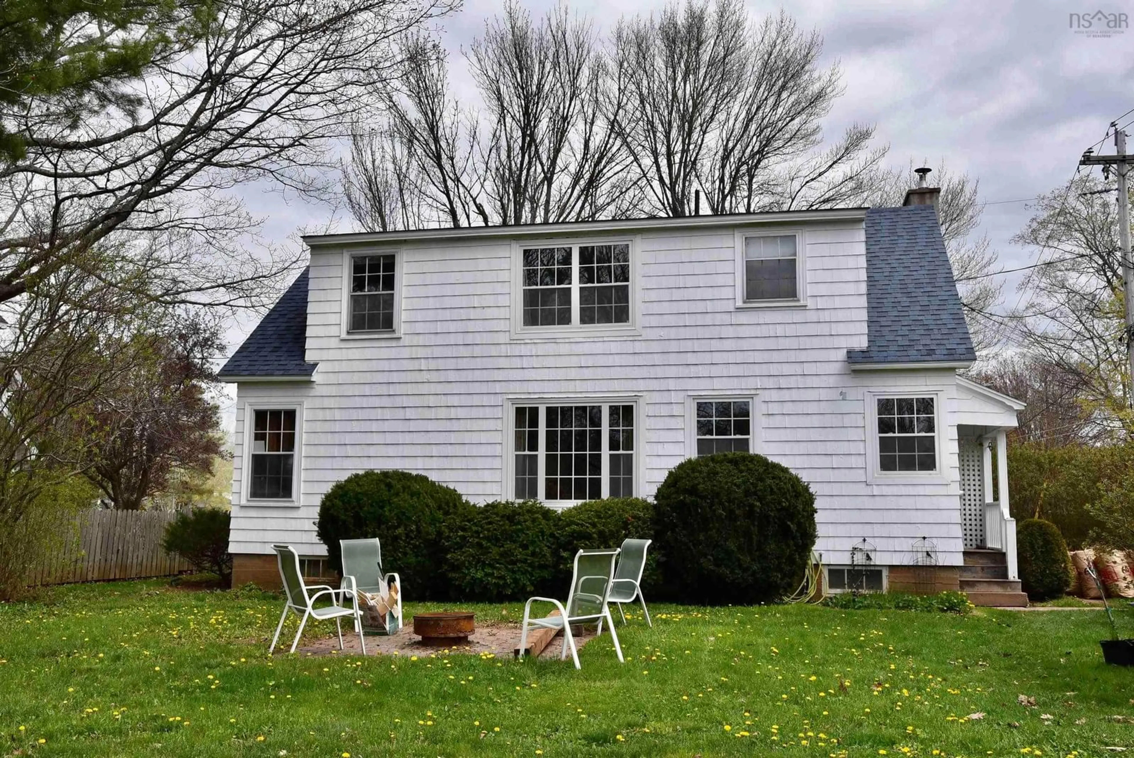 Home with vinyl exterior material, street for 28 Maple St, Middleton Nova Scotia B0S 1P0