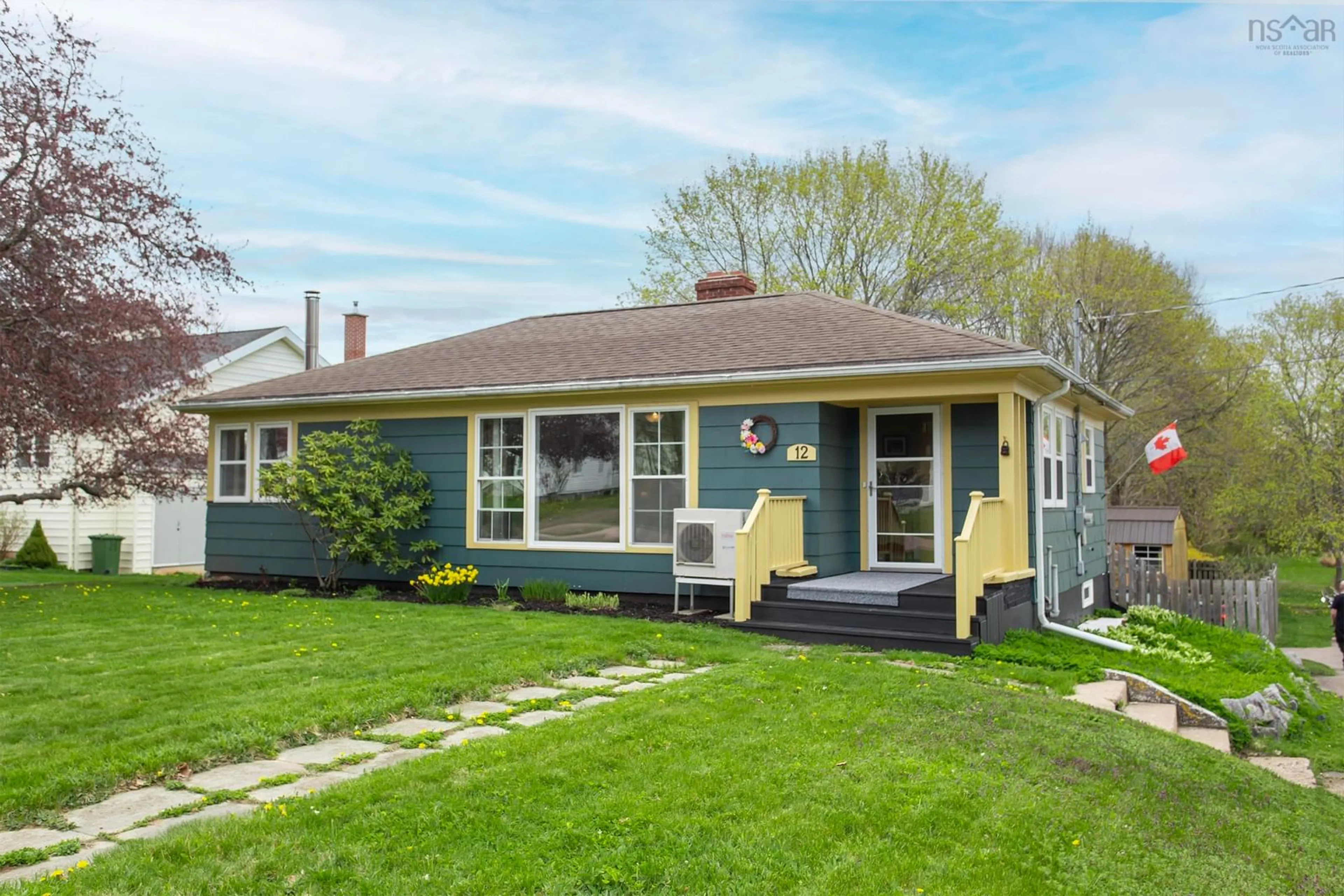 Home with vinyl exterior material, street for 12 Connaught Ave, Middleton Nova Scotia B0S 1P0