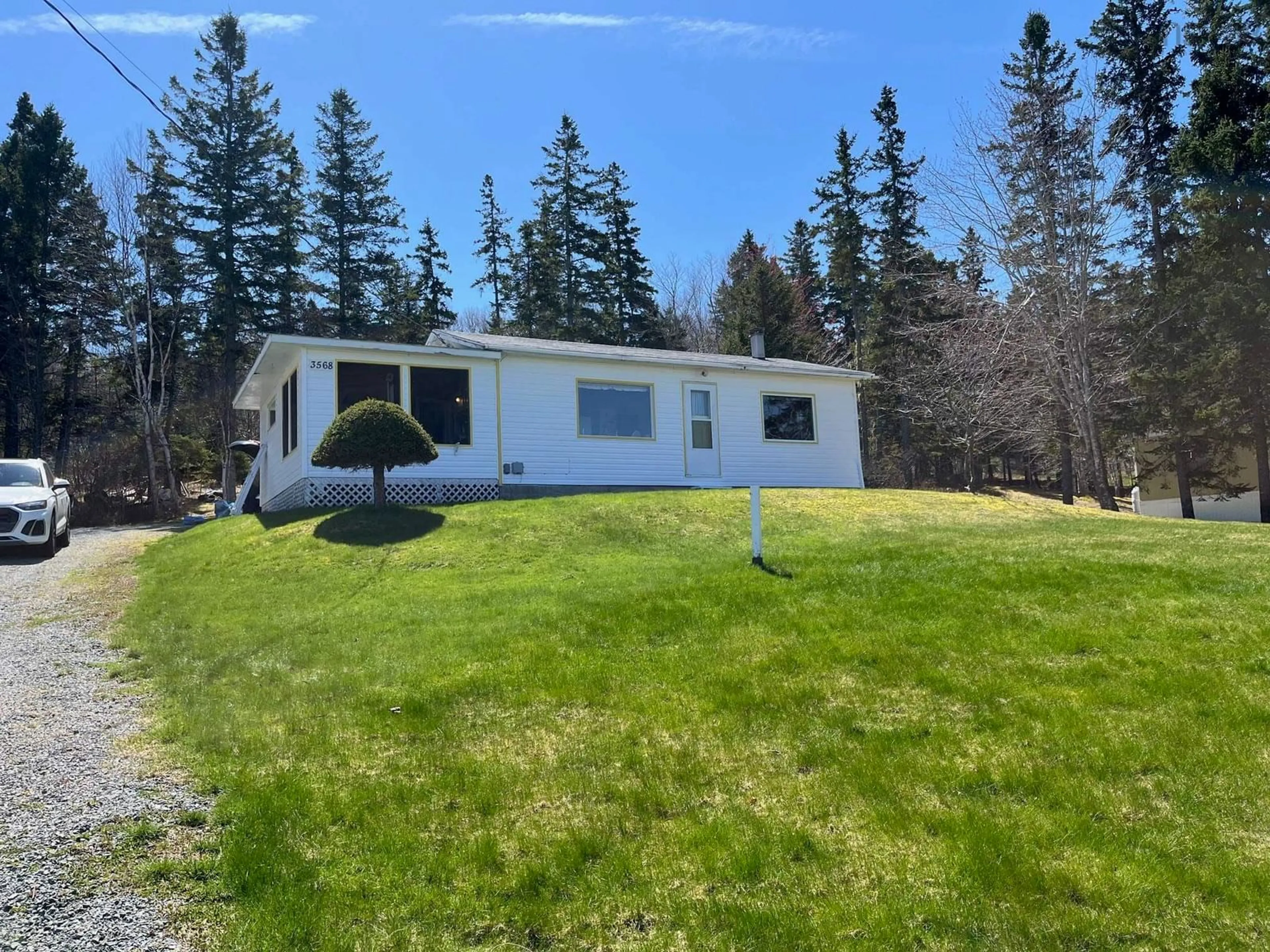 A pic from outside/outdoor area/front of a property/back of a property/a pic from drone, unknown for 3568 West Bay Rd, St. Georges Channel Nova Scotia B0E 3K0