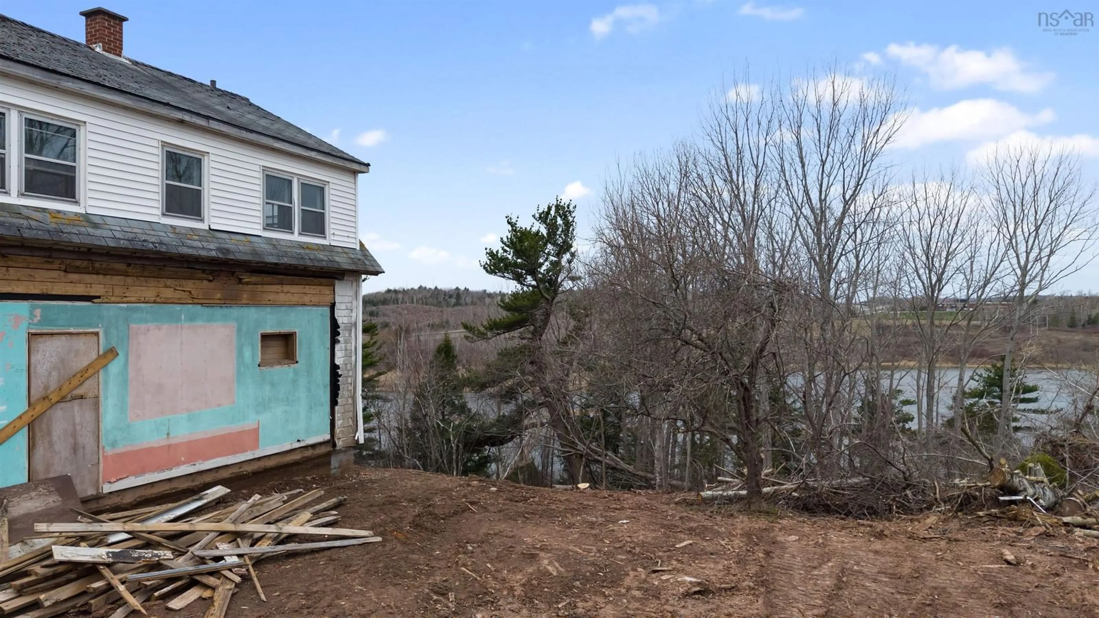 A pic from outside/outdoor area/front of a property/back of a property/a pic from drone, unknown for 99 Shore Rd, Sutherlands River Nova Scotia B0K 1G0