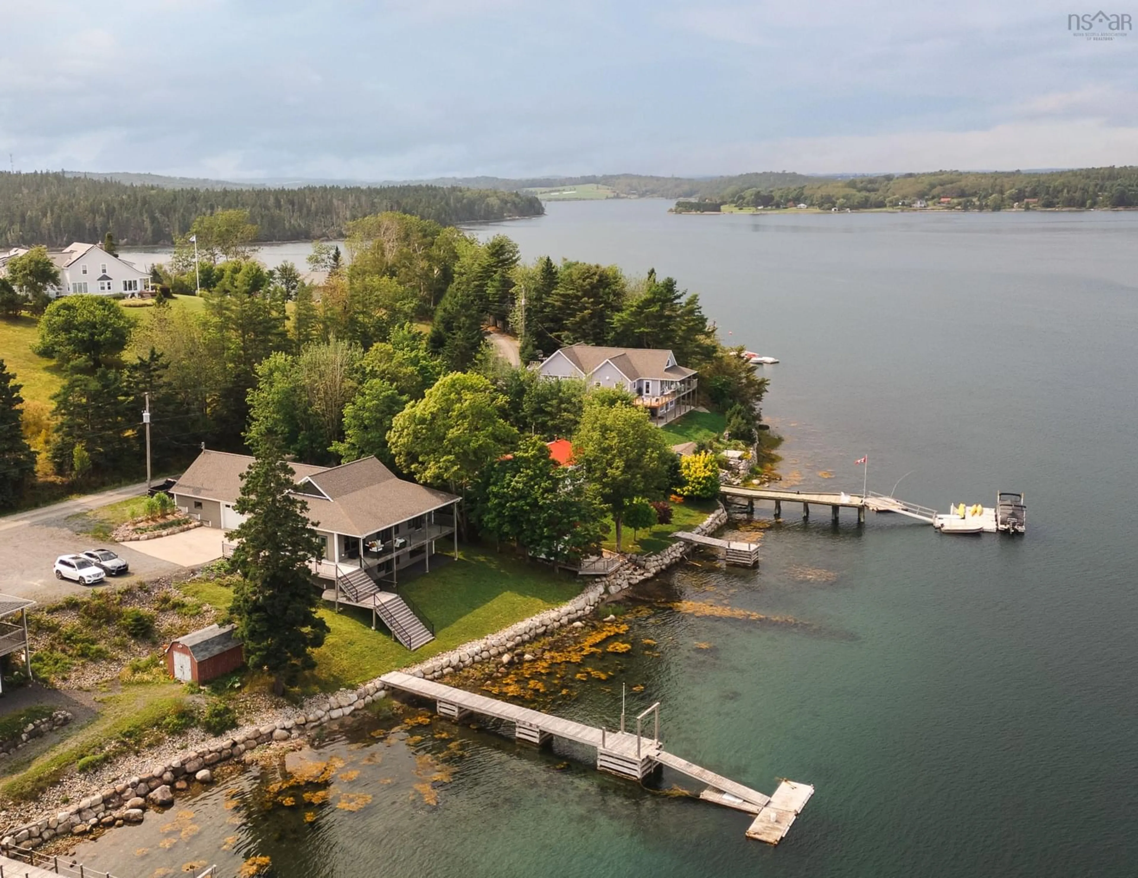 A pic from outside/outdoor area/front of a property/back of a property/a pic from drone, water/lake/river/ocean view for 216 Hebb Point Rd, Heckmans Island Nova Scotia B0J 2C0