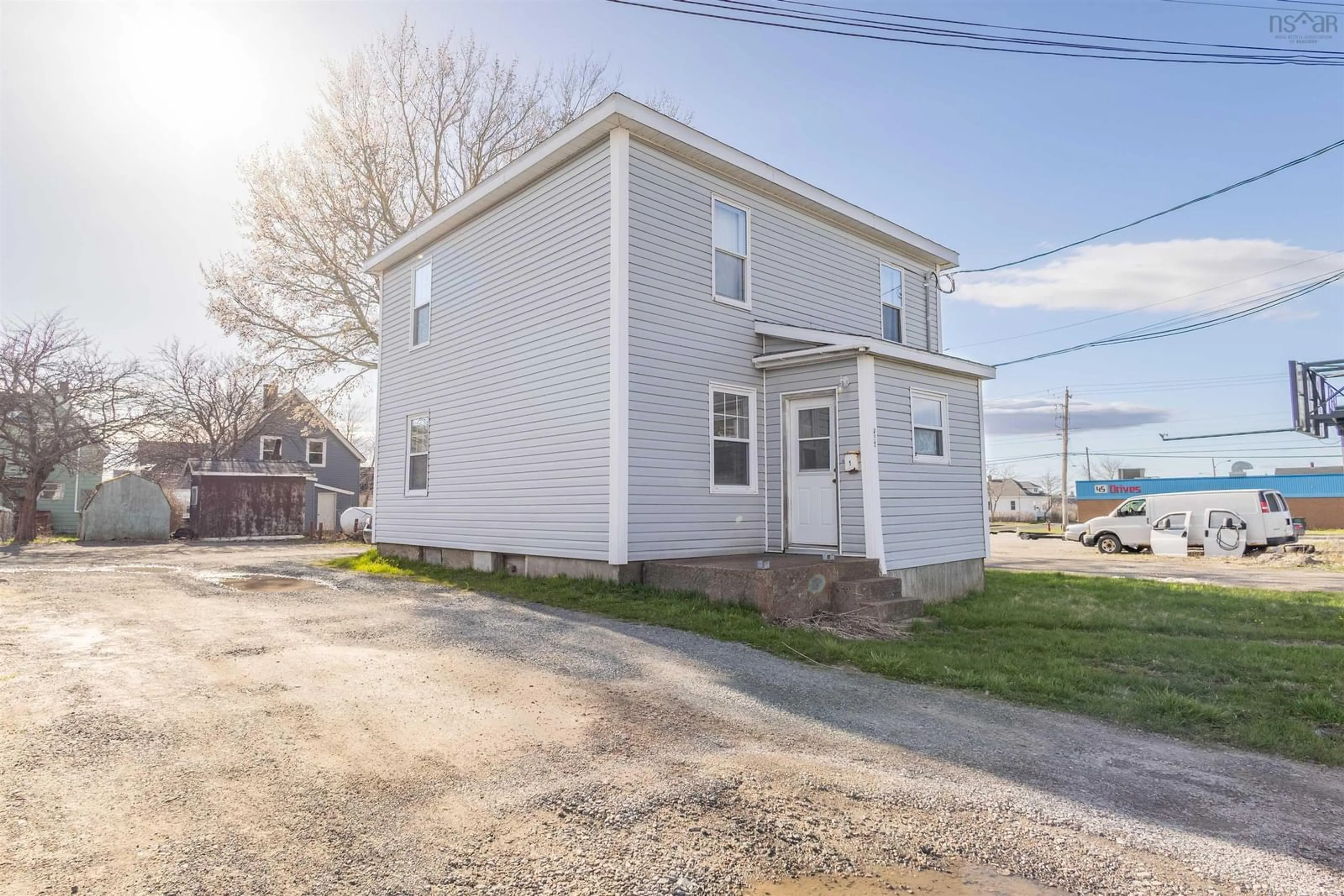A pic from outside/outdoor area/front of a property/back of a property/a pic from drone, street for 455 Whitney Ave, Sydney Nova Scotia B1L 1G2