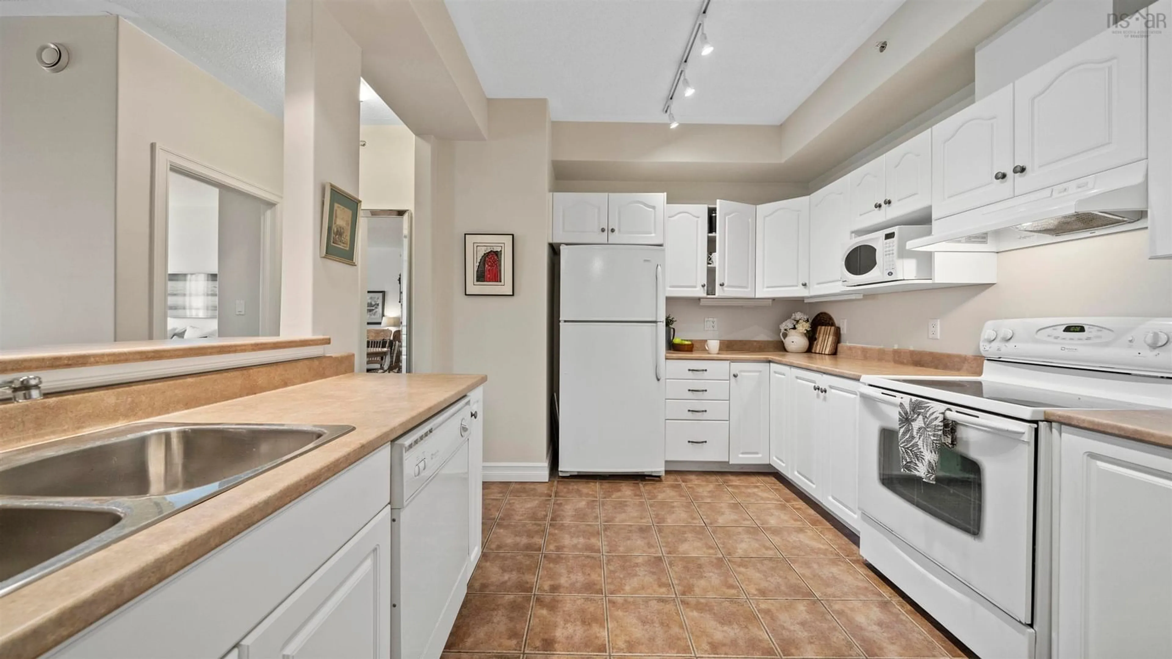Standard kitchen, ceramic/tile floor for 277 Rutledge St #109, Bedford Nova Scotia B4A 4M2