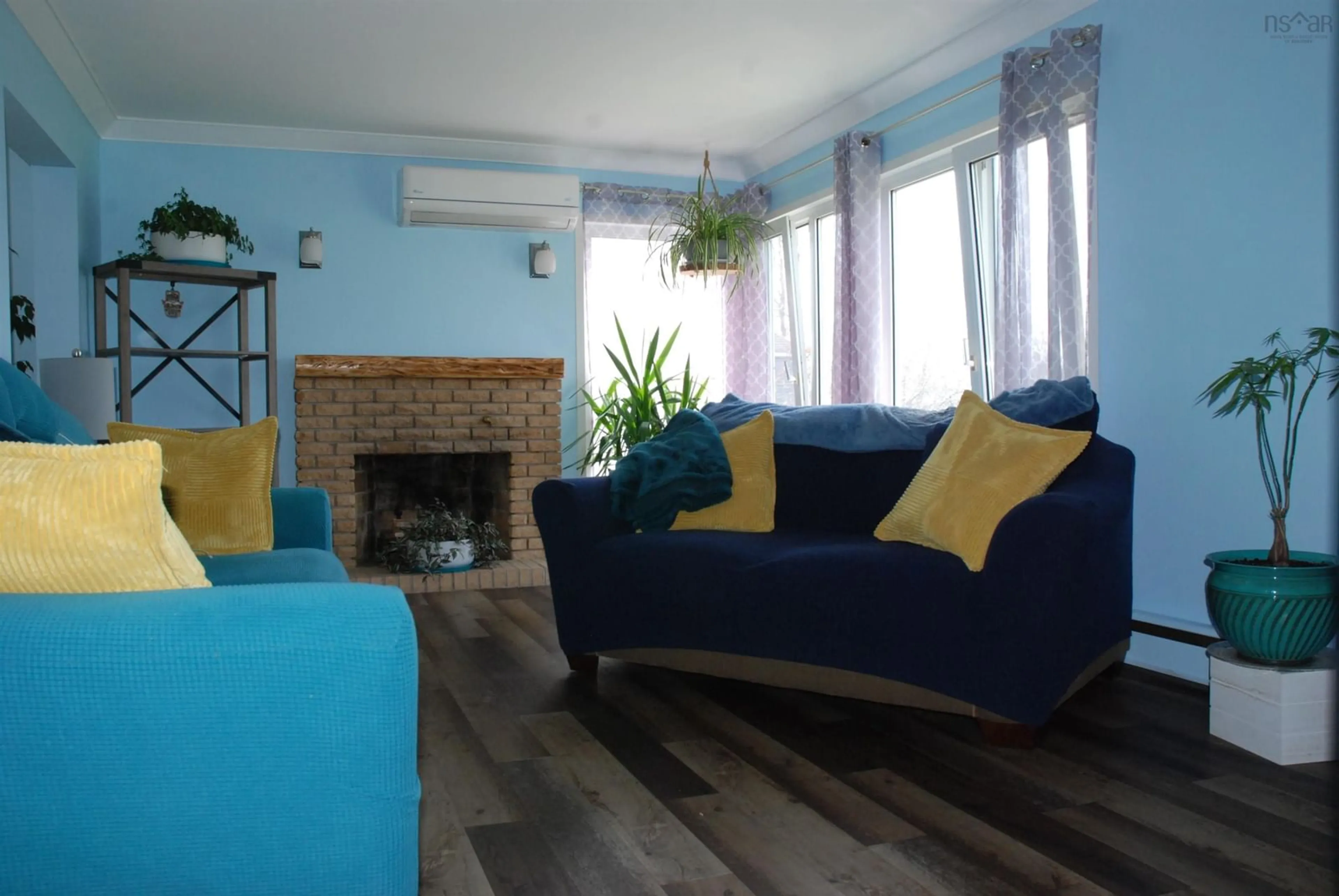 Living room with furniture, wood/laminate floor for 4 White Birch Dr, Port Hawkesbury Nova Scotia B9A 2J2