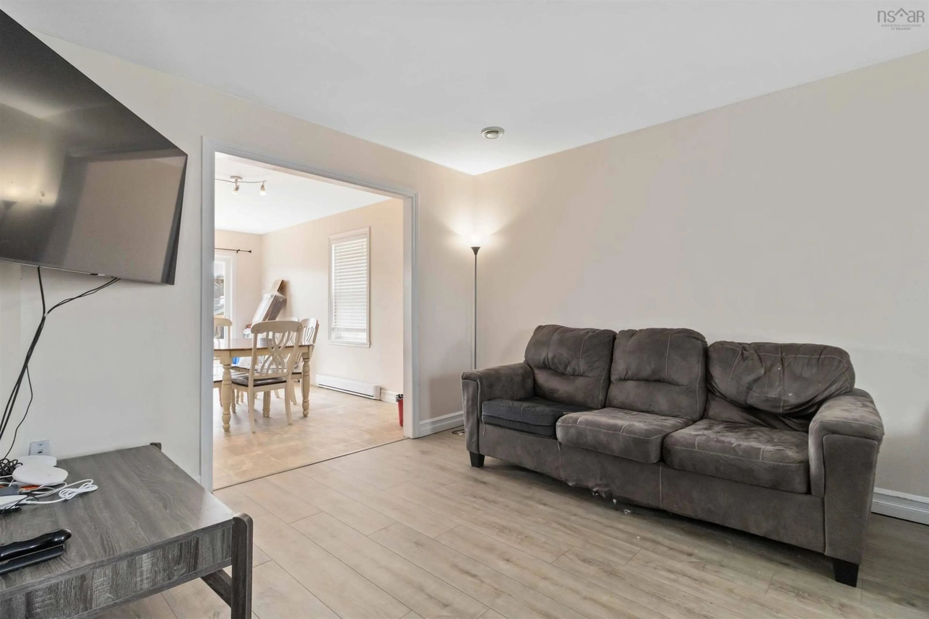 Living room with furniture, wood/laminate floor for 130 Atikian Dr, Eastern Passage Nova Scotia B3G 0A9