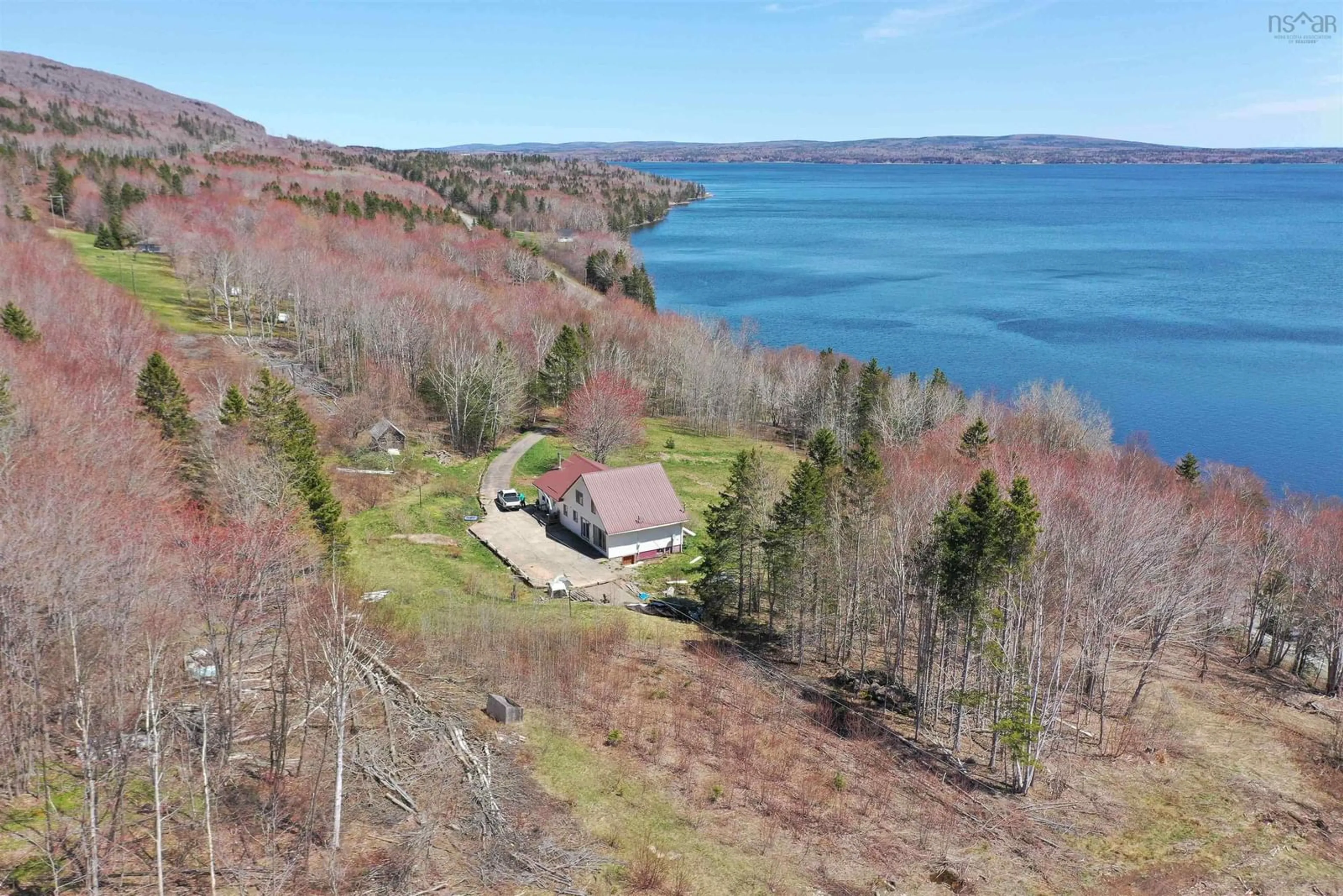 A pic from outside/outdoor area/front of a property/back of a property/a pic from drone, water/lake/river/ocean view for 10783 Ns-105 Hwy, Aberdeen Nova Scotia B0E 3M0