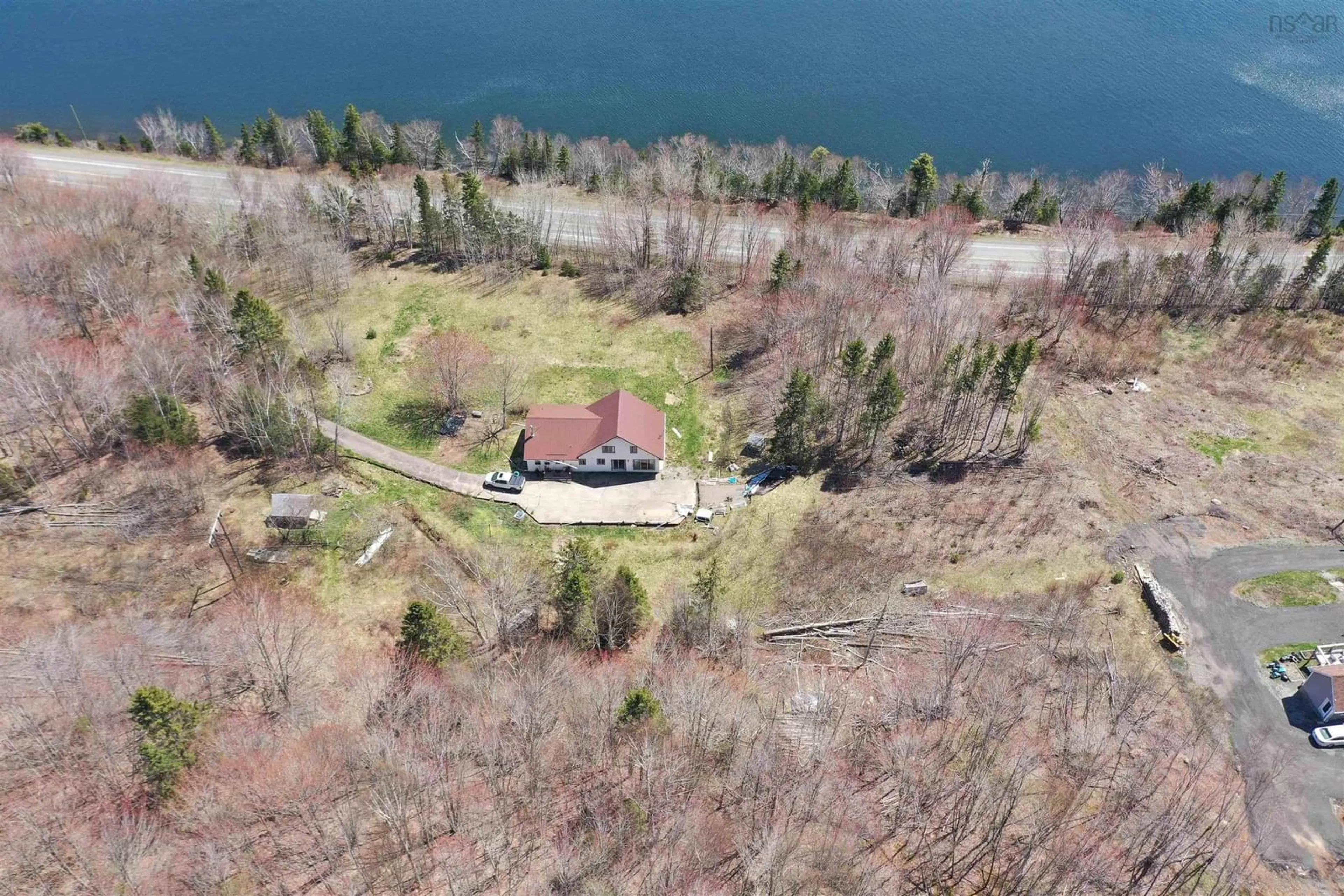 A pic from outside/outdoor area/front of a property/back of a property/a pic from drone, water/lake/river/ocean view for 10783 Ns-105 Hwy, Aberdeen Nova Scotia B0E 3M0