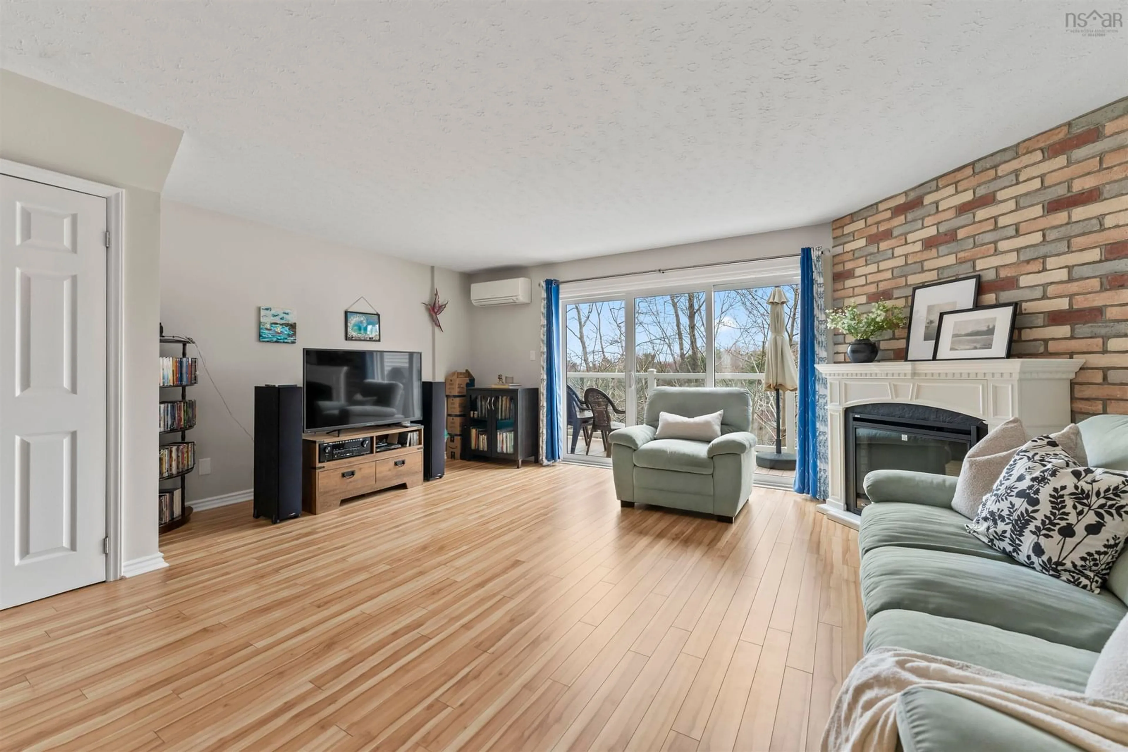 Living room with furniture, wood/laminate floor for 130 Rutledge St, Bedford Nova Scotia B4A 1X6