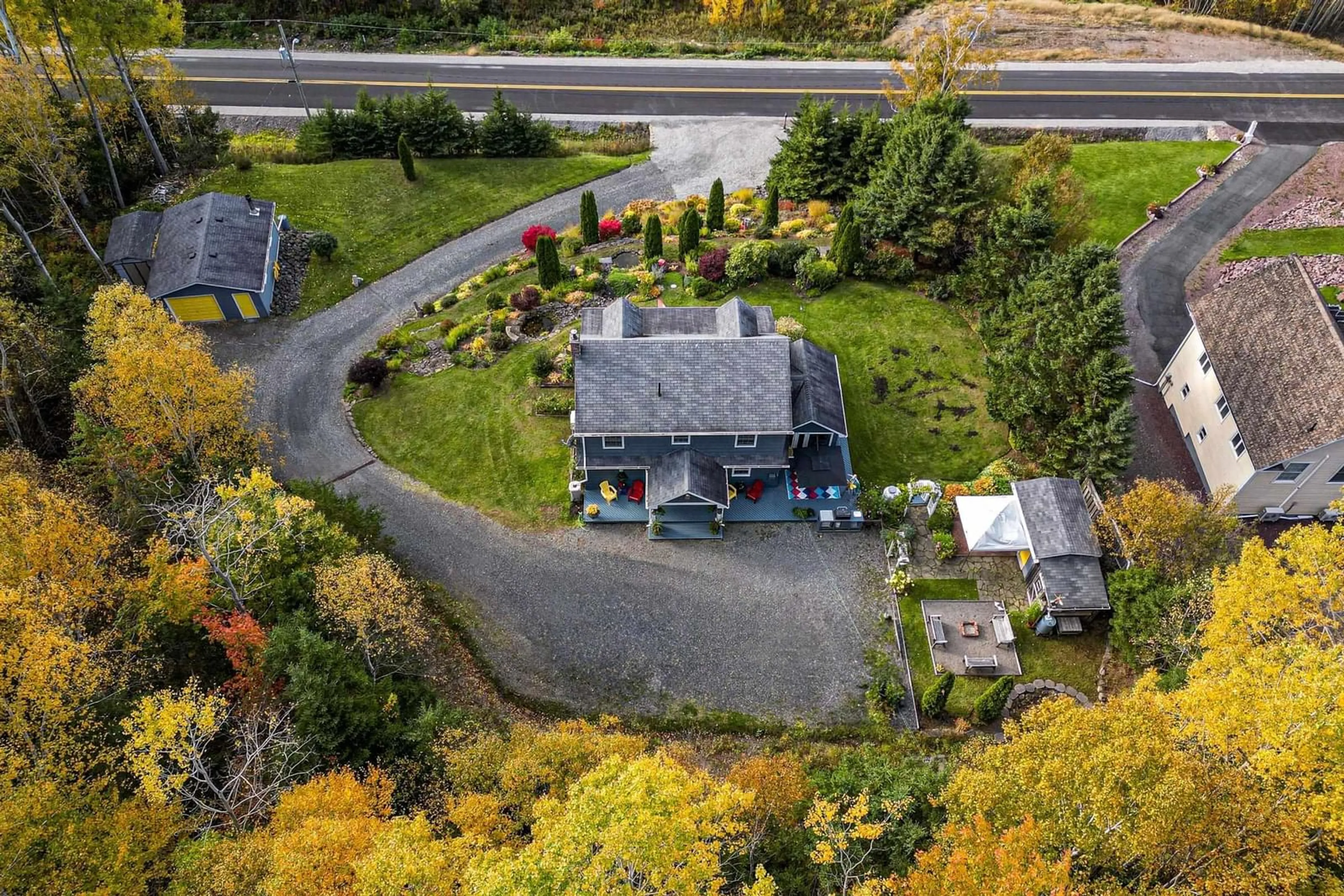 A pic from outside/outdoor area/front of a property/back of a property/a pic from drone, street for 3341 Long Island Rd, Barrachois Nova Scotia B1Y 3N1