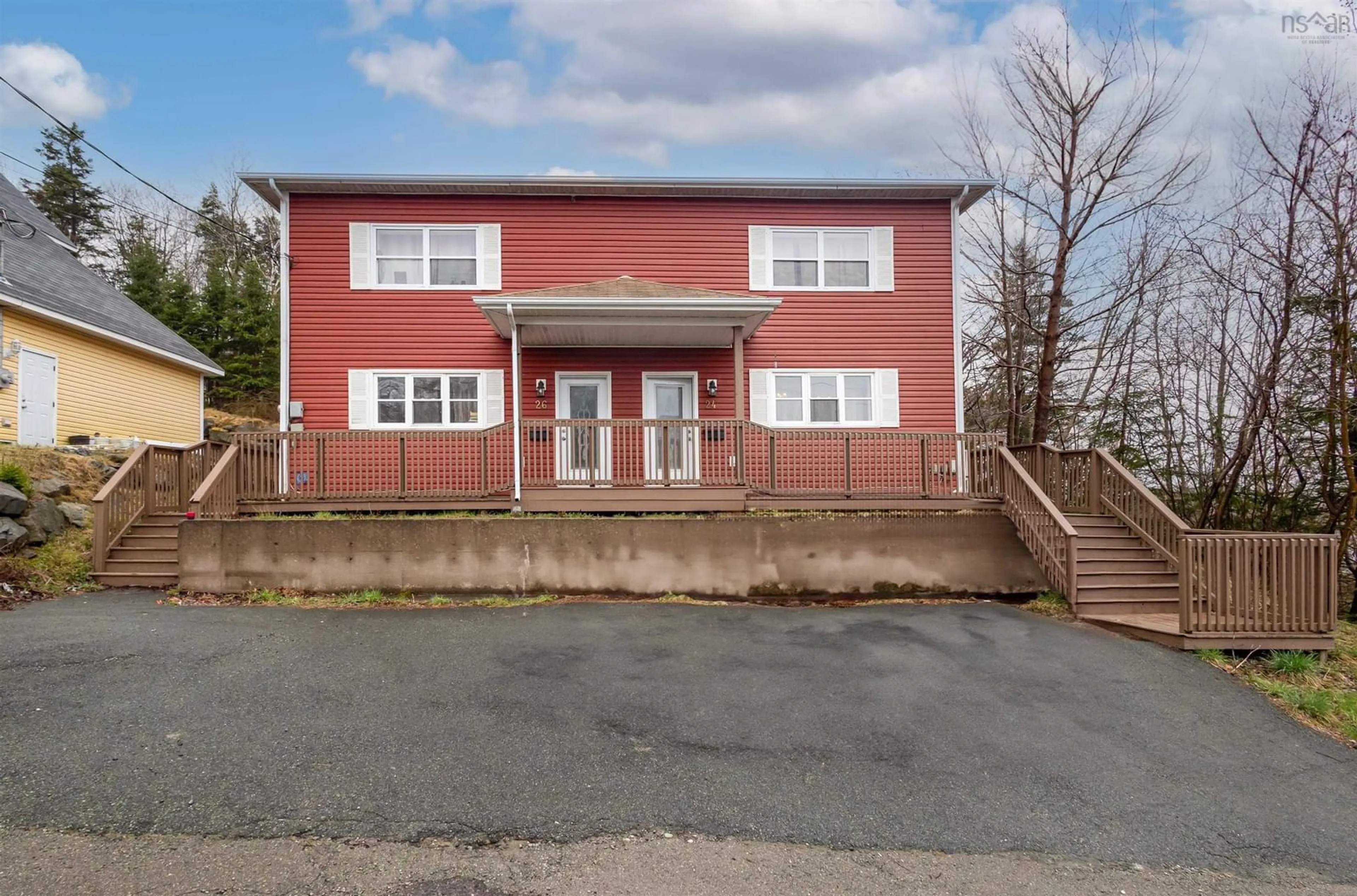 A pic from outside/outdoor area/front of a property/back of a property/a pic from drone, building for 24-26 Weidner Dr, Sydney River Nova Scotia B1S 1V5