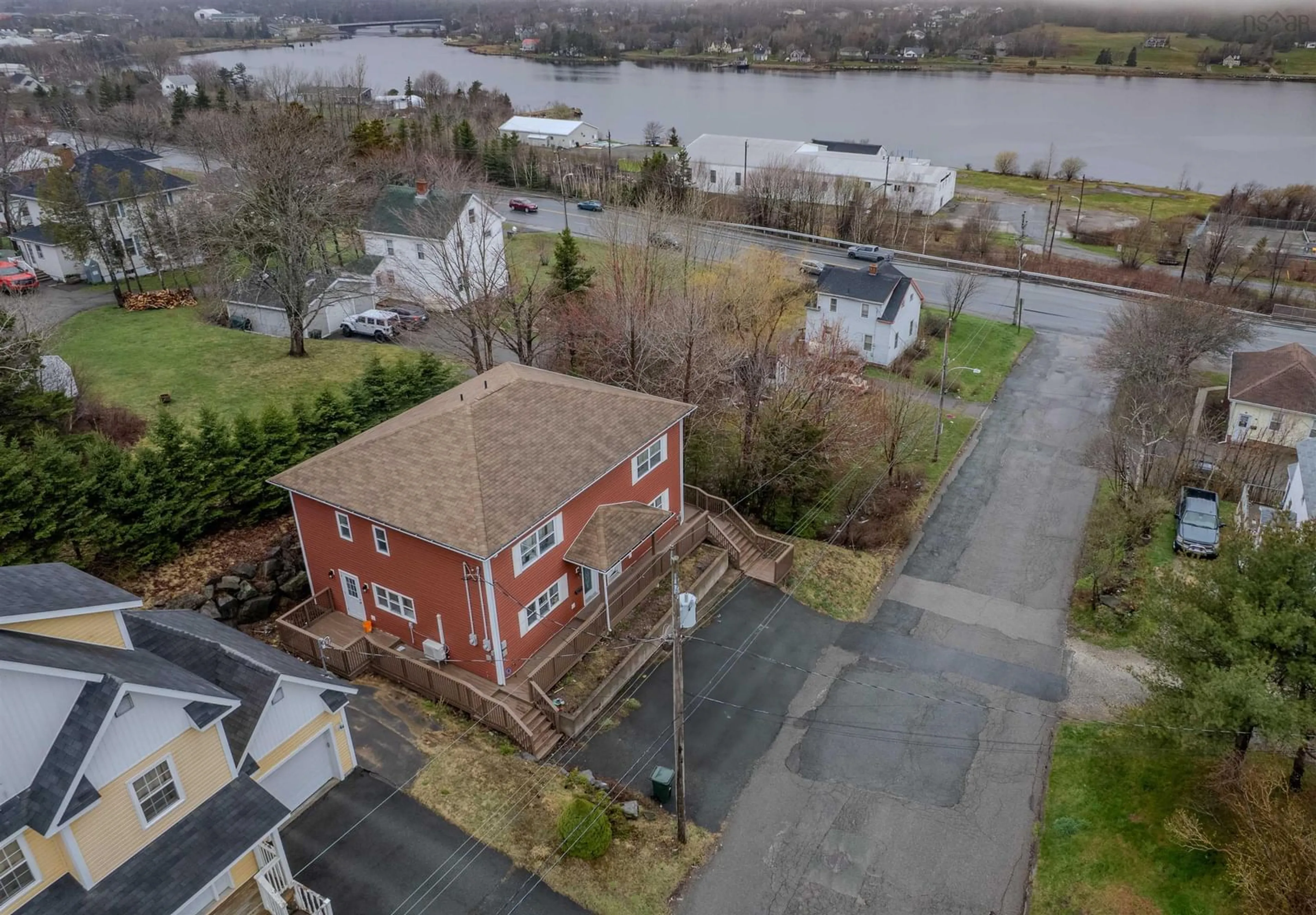 A pic from outside/outdoor area/front of a property/back of a property/a pic from drone, water/lake/river/ocean view for 24-26 Weidner Dr, Sydney River Nova Scotia B1S 1V5