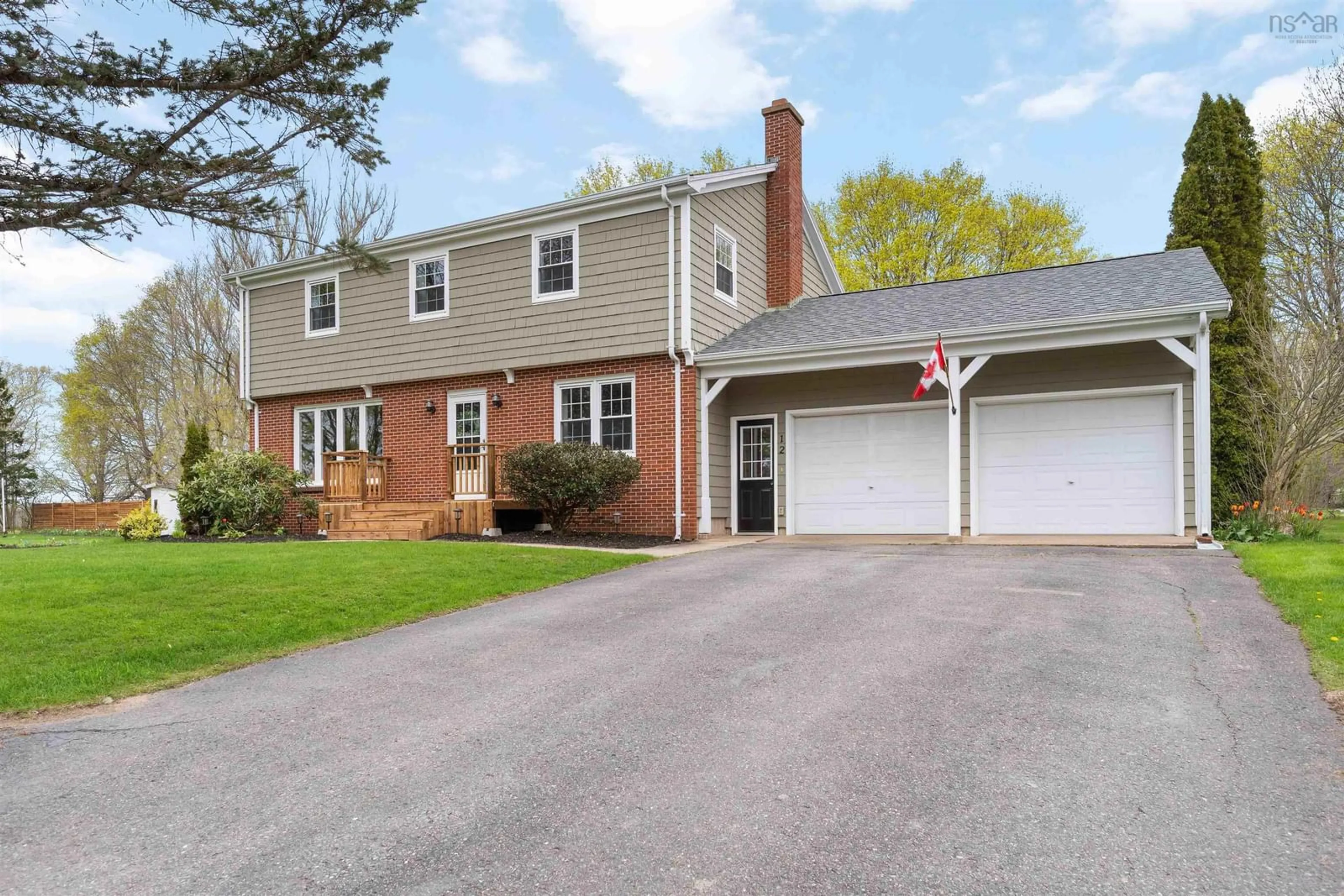 Home with vinyl exterior material, street for 12 Hillcrest Ave, Nictaux Nova Scotia B0S 1P0