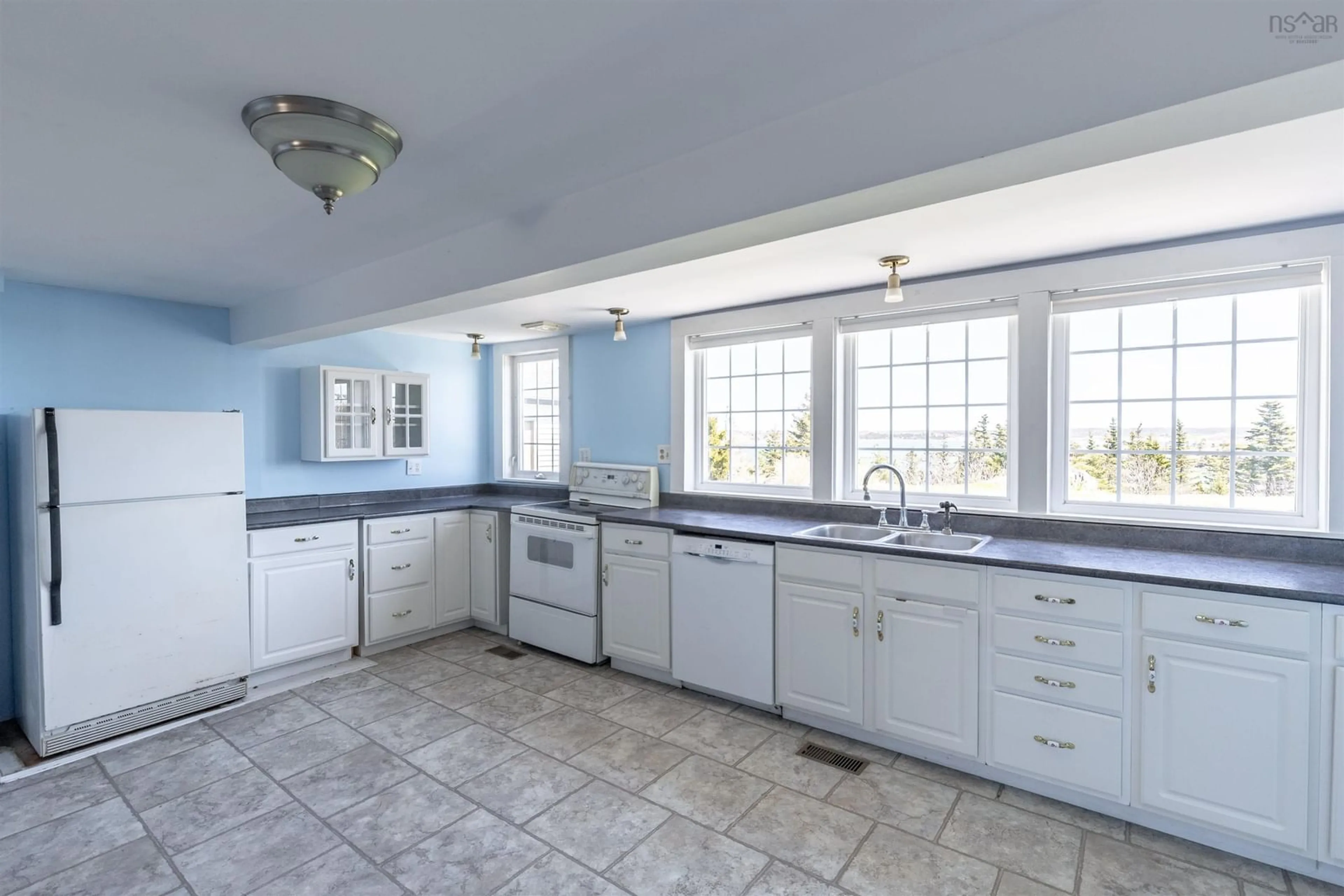 Open concept kitchen, ceramic/tile floor for 1415 Highway 304, Cape Forchu Nova Scotia B5A 5G7