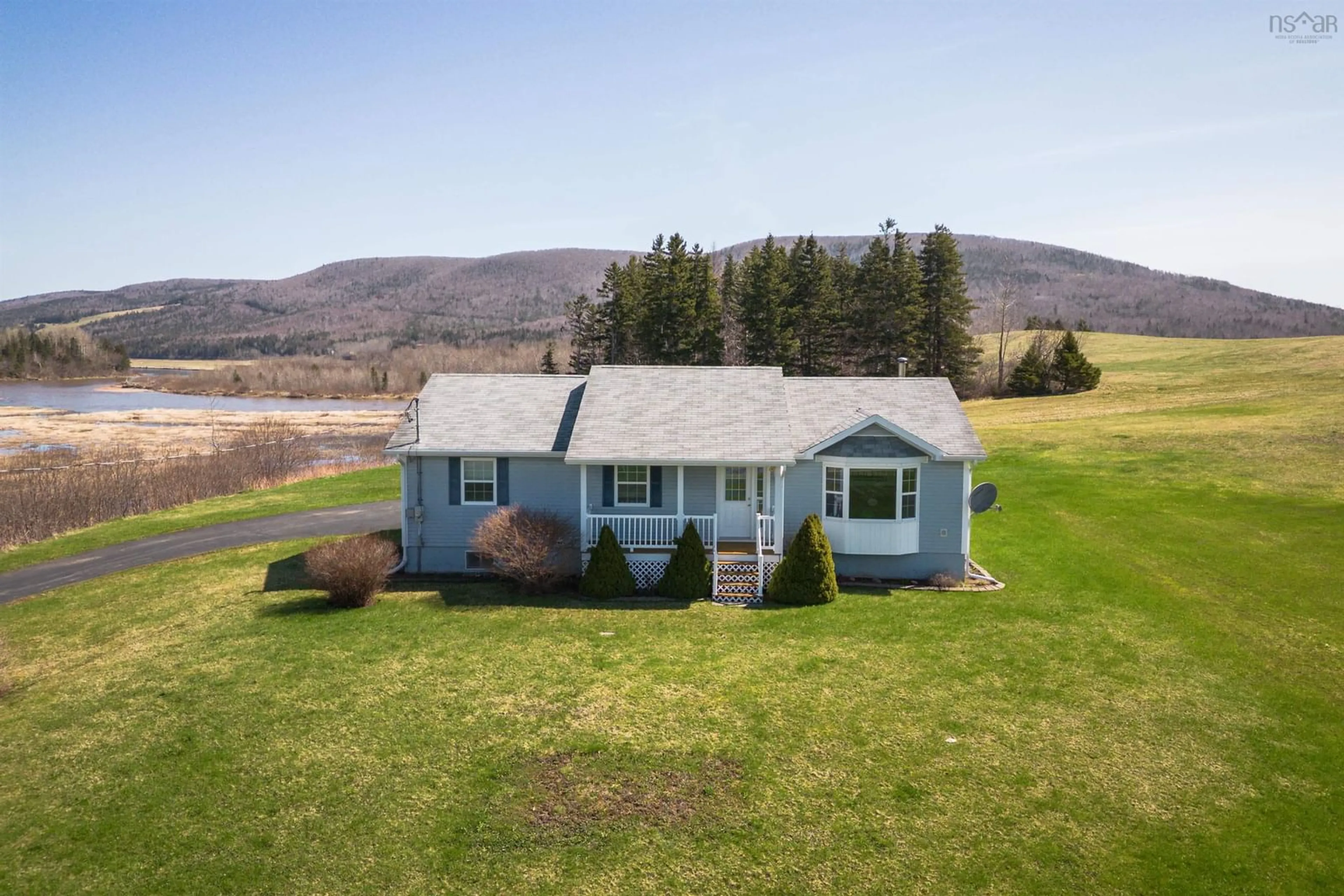A pic from outside/outdoor area/front of a property/back of a property/a pic from drone, mountain view for 7966 Cabot Trail Rd, Margaree Forks Nova Scotia B0E 2A0