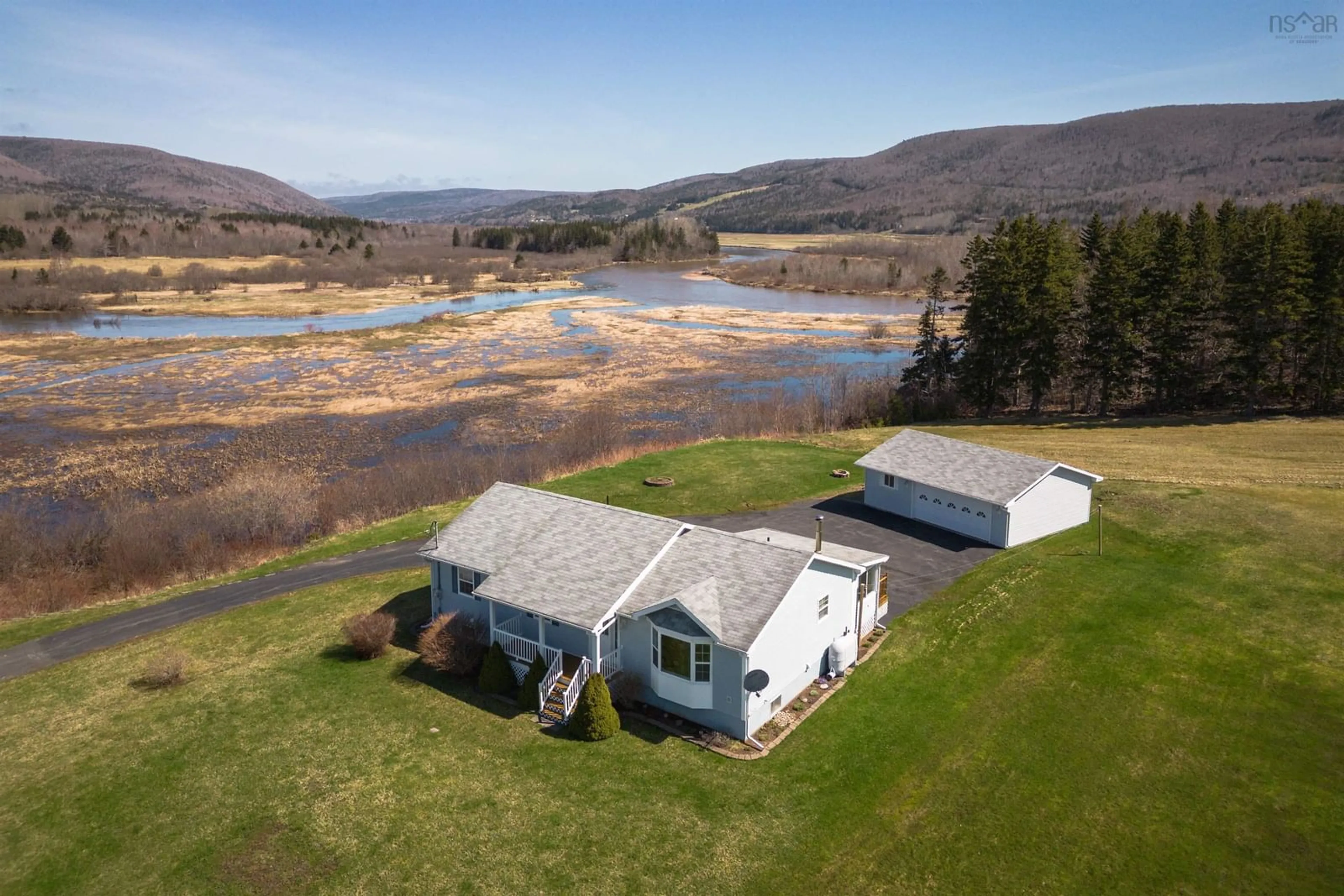 A pic from outside/outdoor area/front of a property/back of a property/a pic from drone, water/lake/river/ocean view for 7966 Cabot Trail Rd, Margaree Forks Nova Scotia B0E 2A0