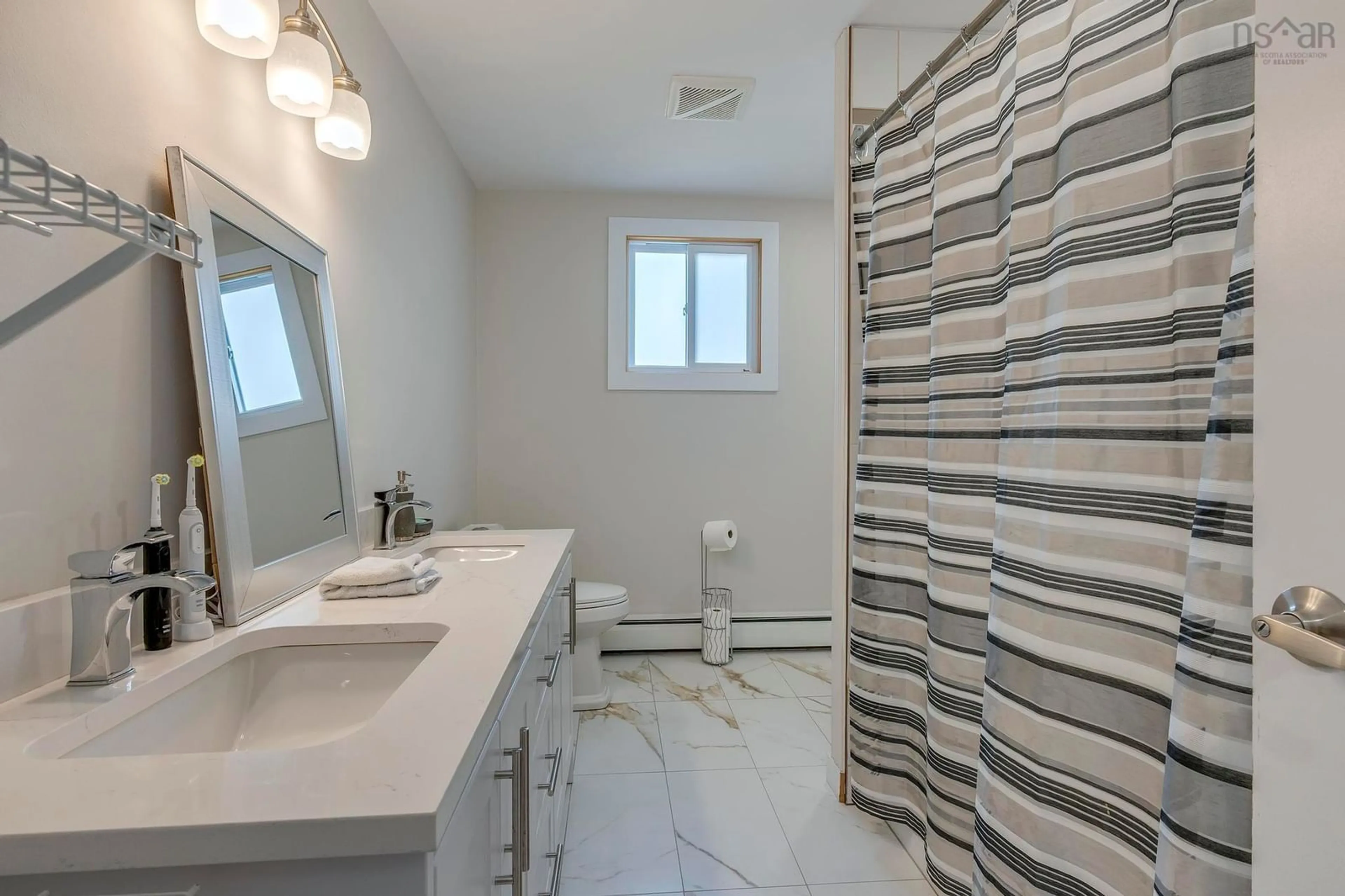 Standard bathroom, ceramic/tile floor for 95 Bayview Rd, Halifax Nova Scotia B3M 1N8