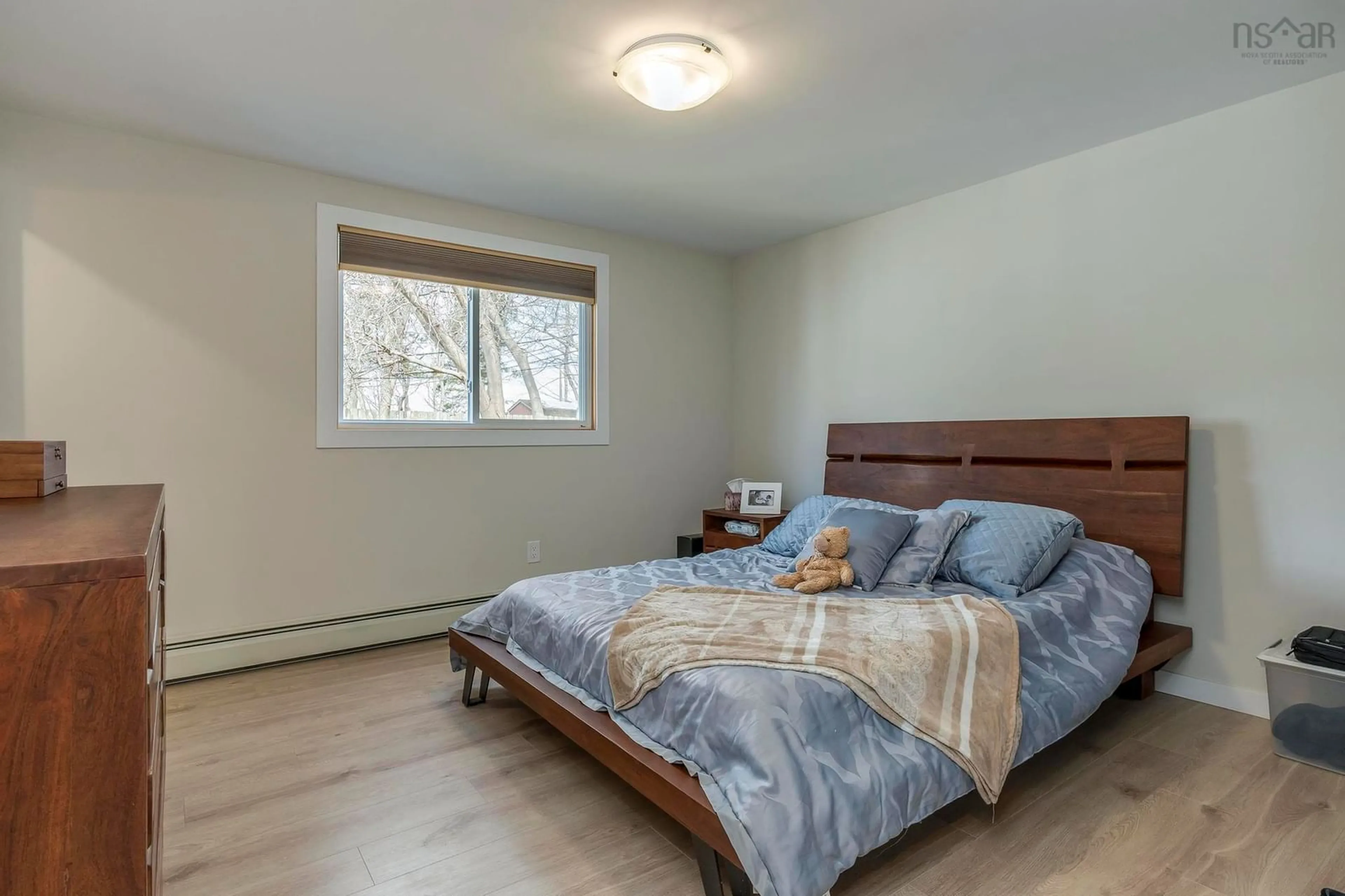 Bedroom with bed, wood/laminate floor for 95 Bayview Rd, Halifax Nova Scotia B3M 1N8